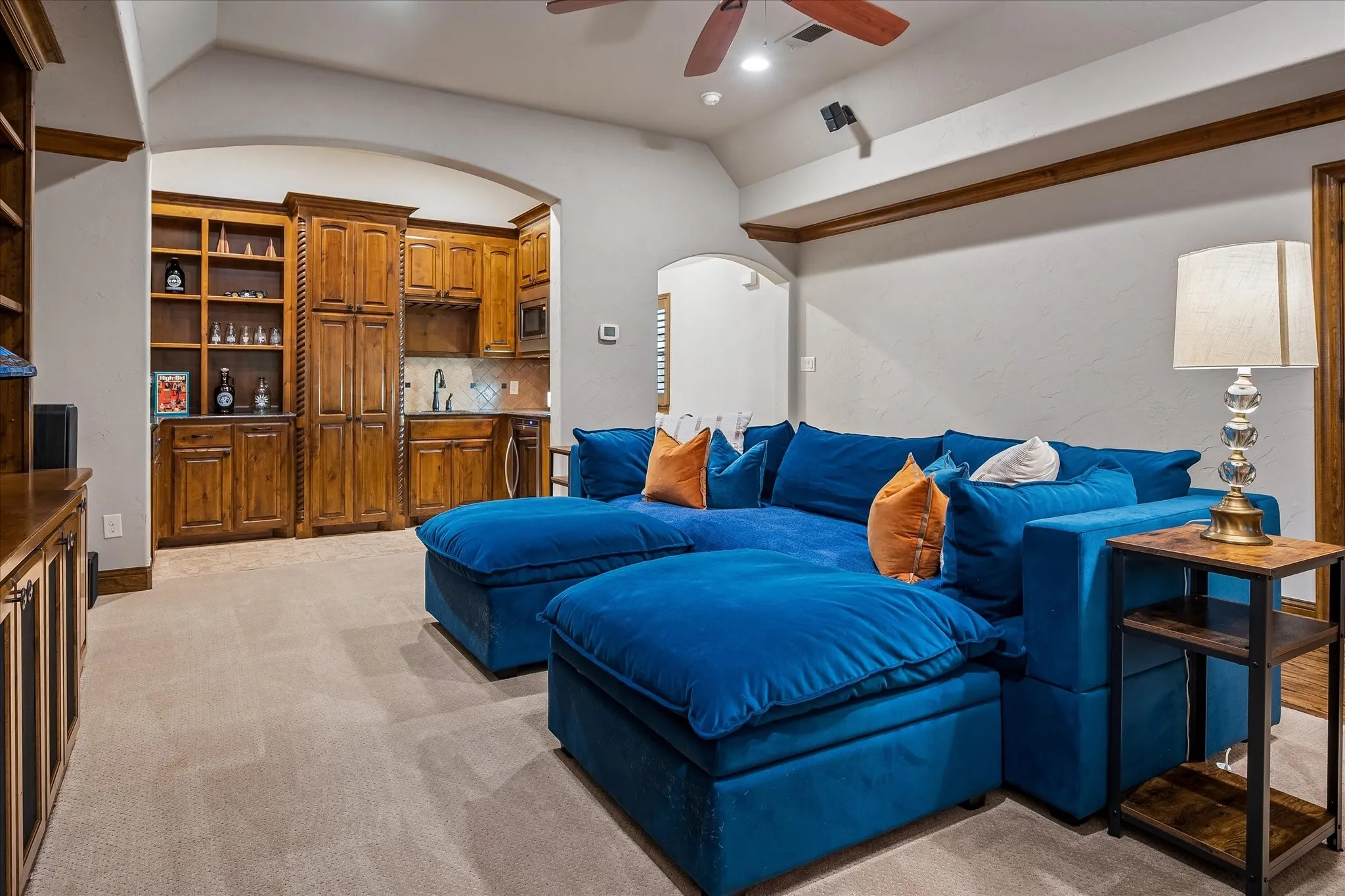 Upstairs living room with direct access to private media room.