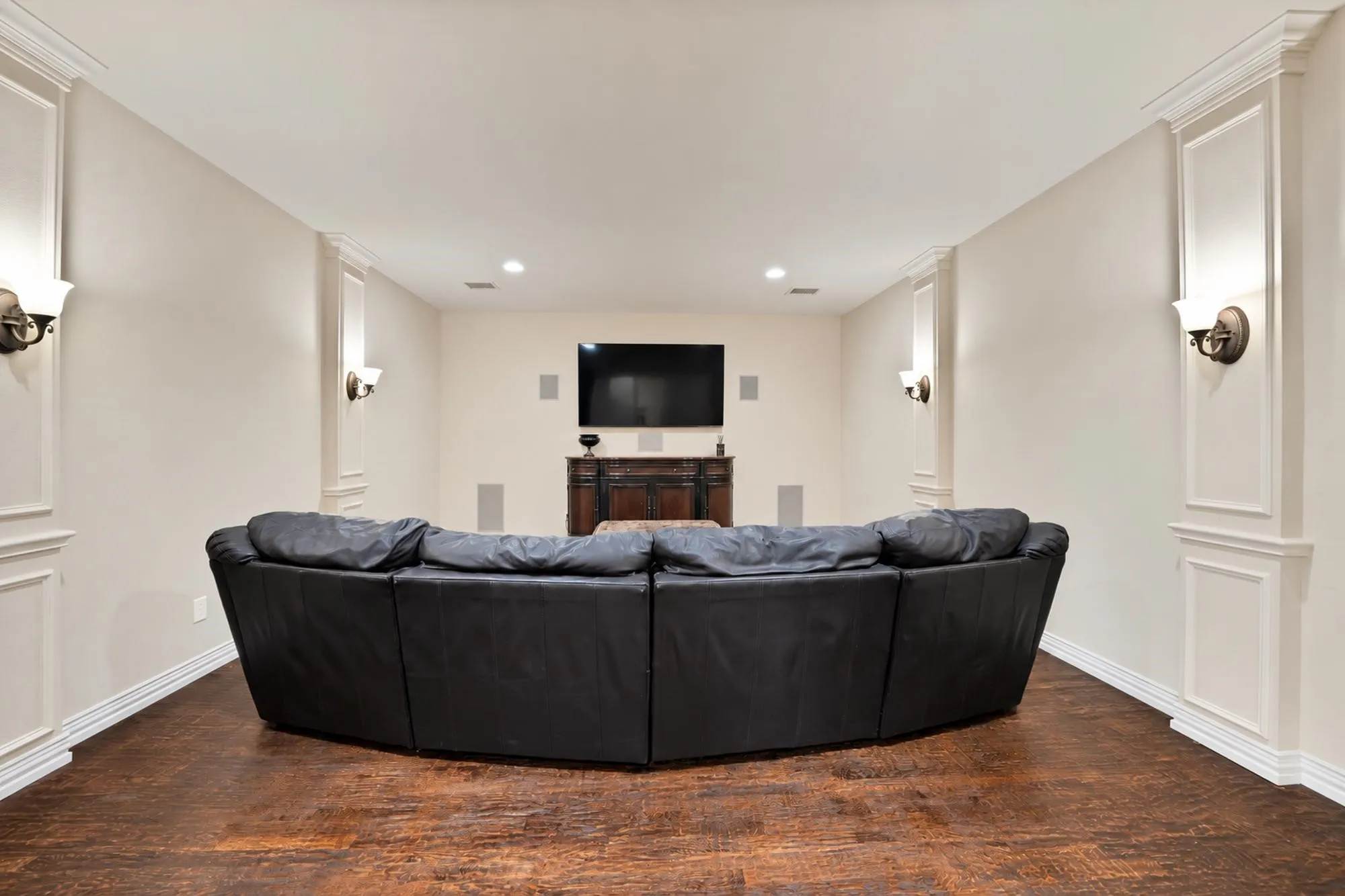 Upstairs, the media room sets the stage for unforgettable movie nights, game days, and entertaining, offering the perfect space to gather, relax, and enjoy your favorite moments together.