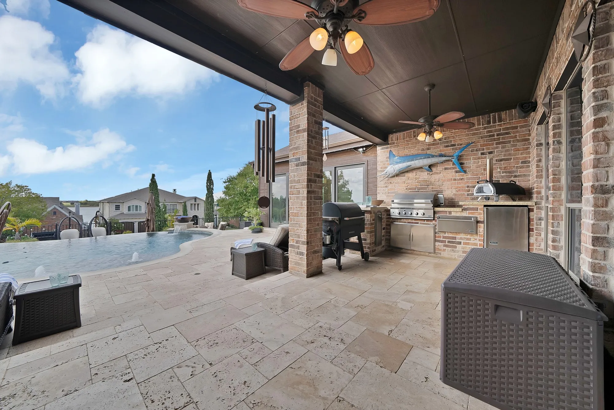 Step outside into a breathtaking private oasis, where resort-style features create an extraordinary setting for relaxing, entertaining, and enjoying the beauty of the outdoors.
