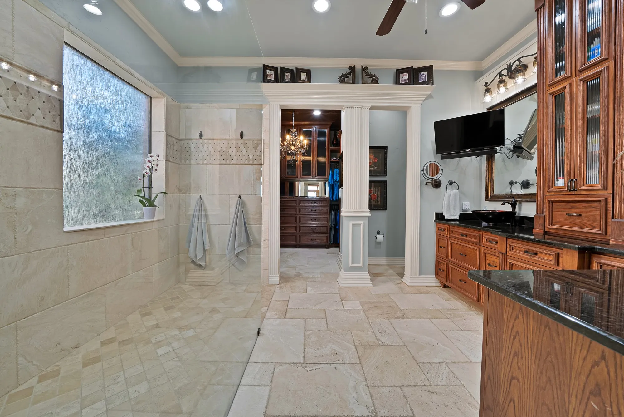 A beautifully updated primary bathroom delivers a true resort-inspired experience, featuring sophisticated finishes and generous space. Every detail creates a luxurious, spa-like retreat designed for comfort and relaxation.