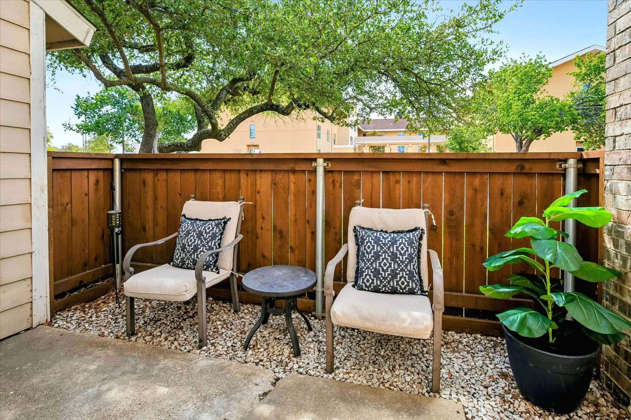 Great outdoor patio space with no other units behind.