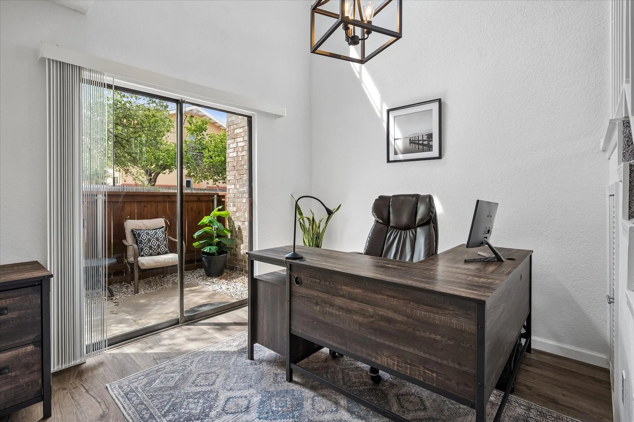 Versatile area that can be used as a study, stay at home office or dining room. Under the stairs to the right is a large closet area. Great access to the outdoors right outside the room make this an enjoyable place to work or eat!