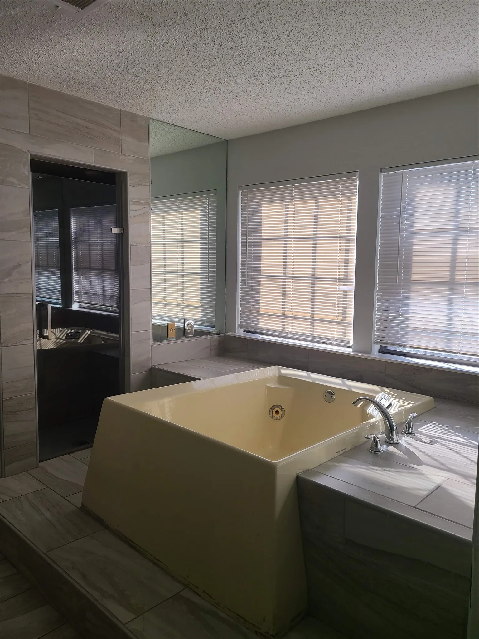 Relax in the hot tub overlooking yard!