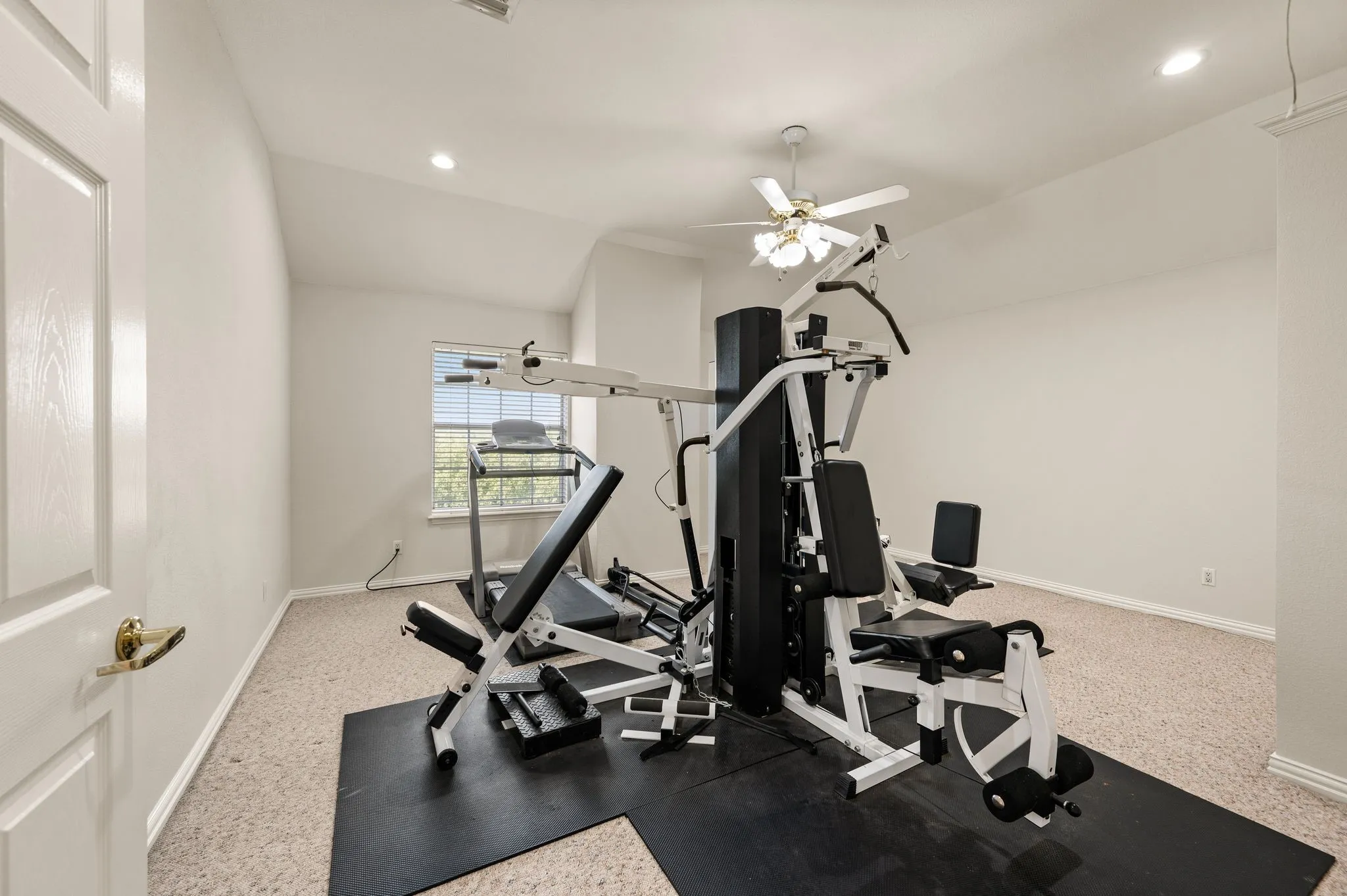 Recessed lighting and ceiling fan overhead
