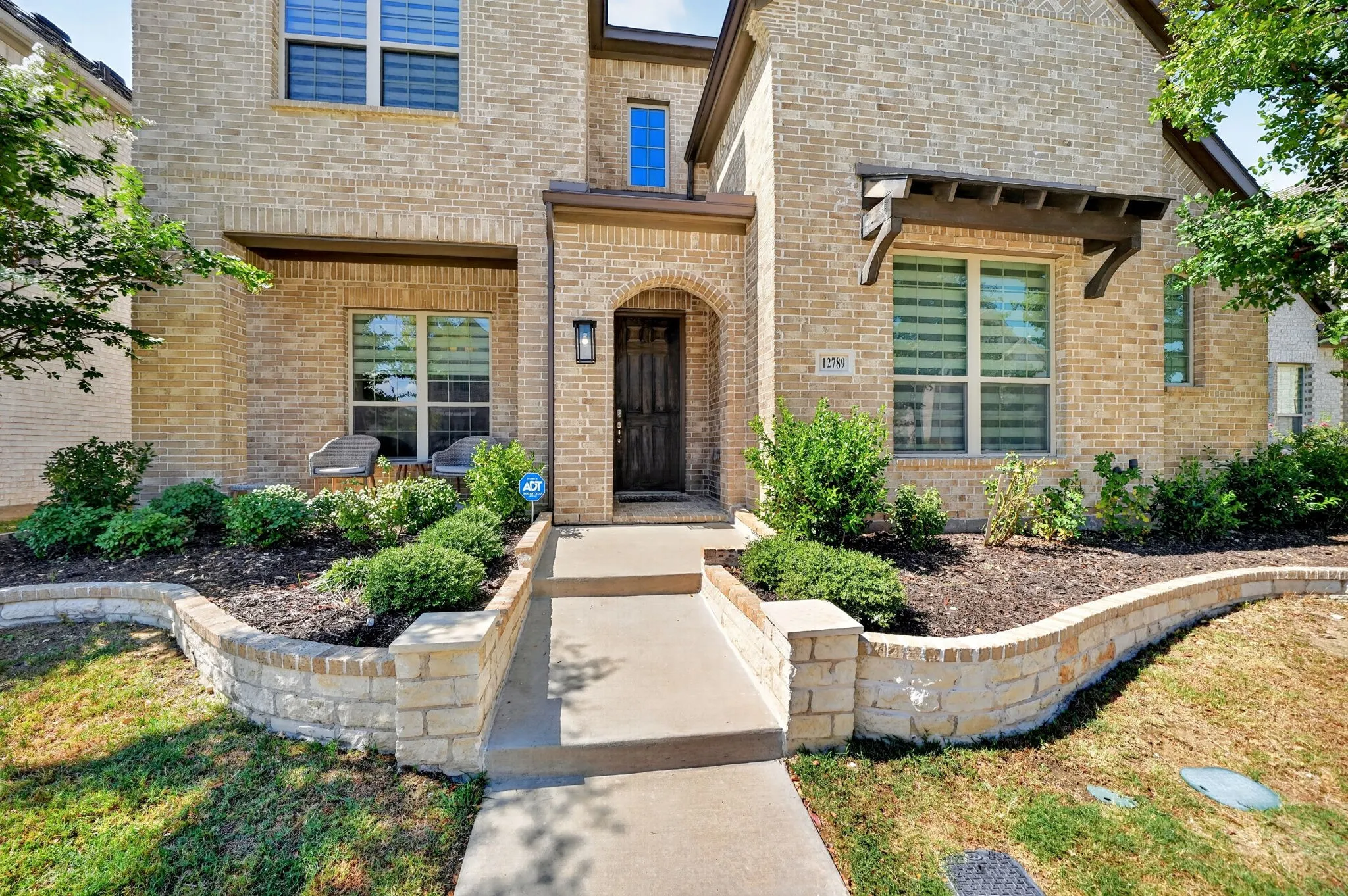 Brick exterior with arched entryway