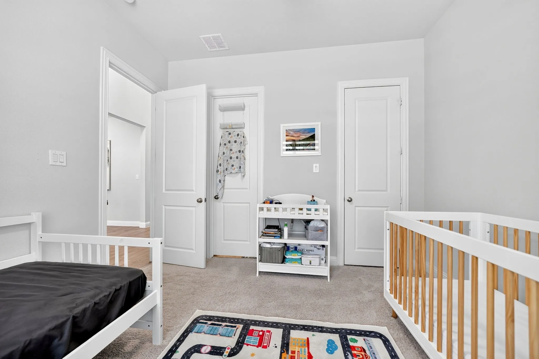 Neutral-toned walls and carpeted flooring