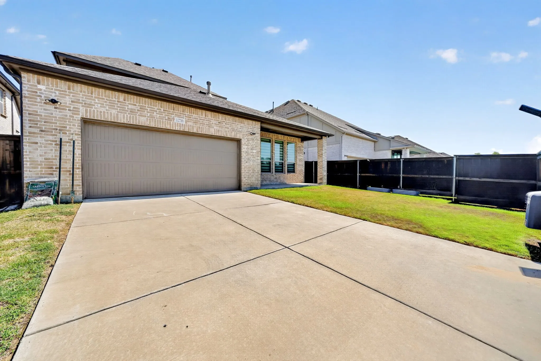 Brick exterior with attached garage
