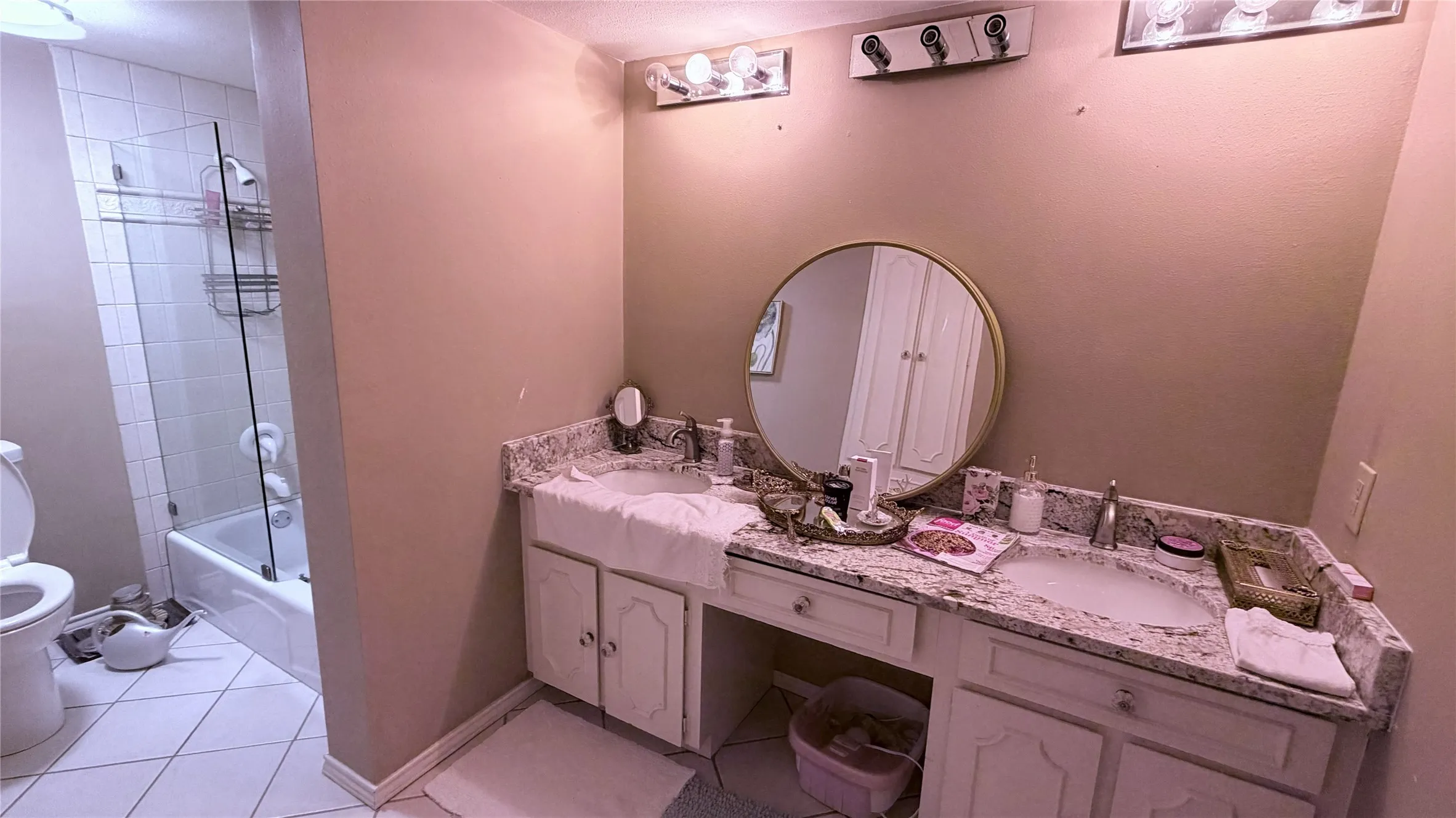 Double vanity with stone countertop
