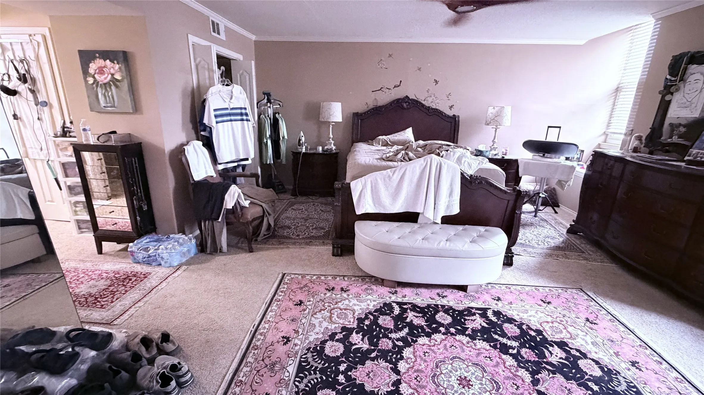 Carpeted flooring, window with blinds, and ceiling fan