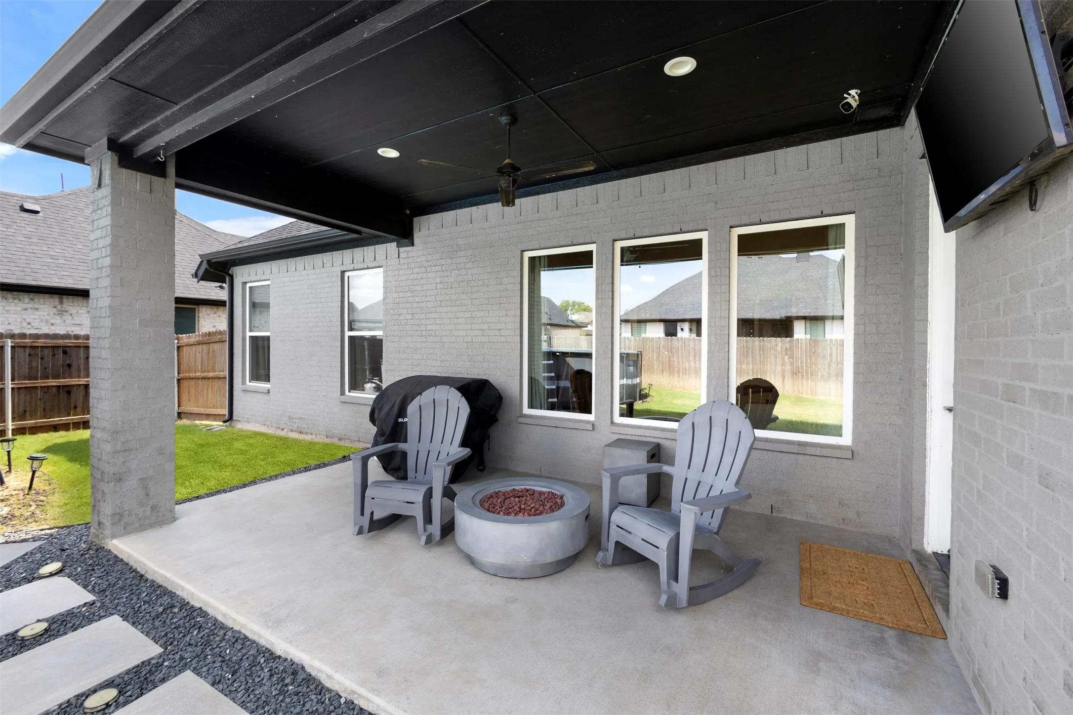 Large covered porch is another place perfect for relaxing or taking the entertainment out back