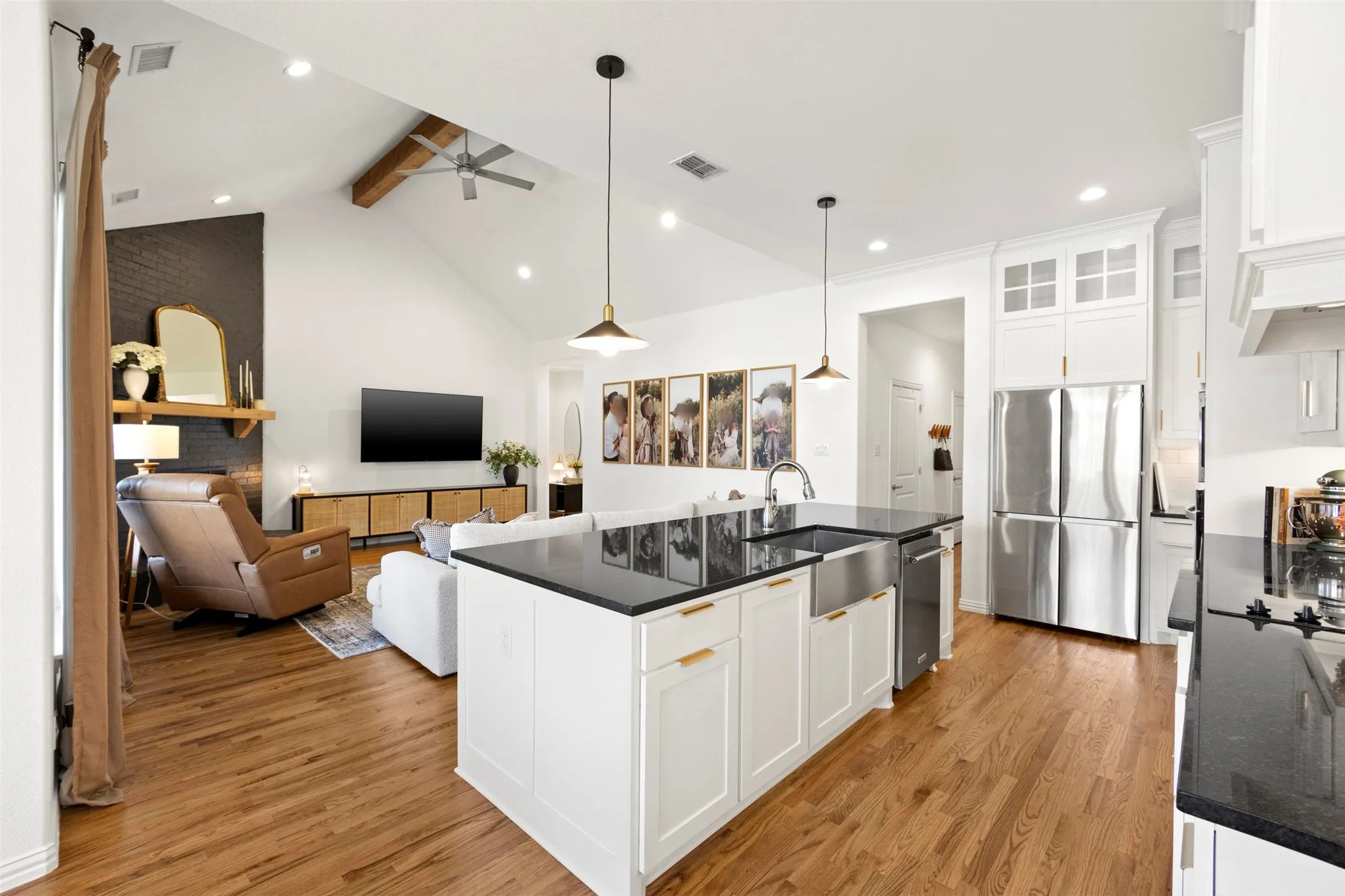 Open concept kitchen with magnificent red oak hardwood flooring
