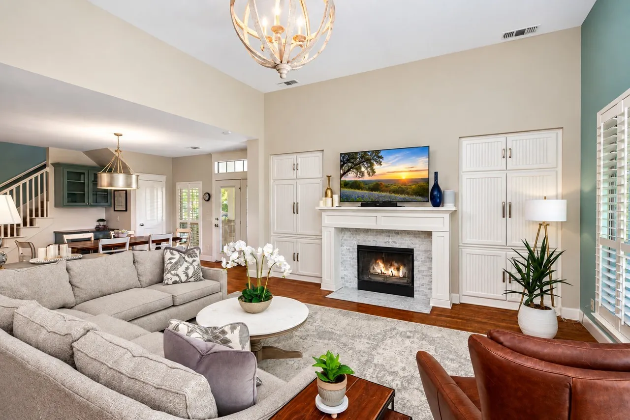 Living Area made for entertaining and relaxing with Built Ins offering a built in cabinets with lots of storage!