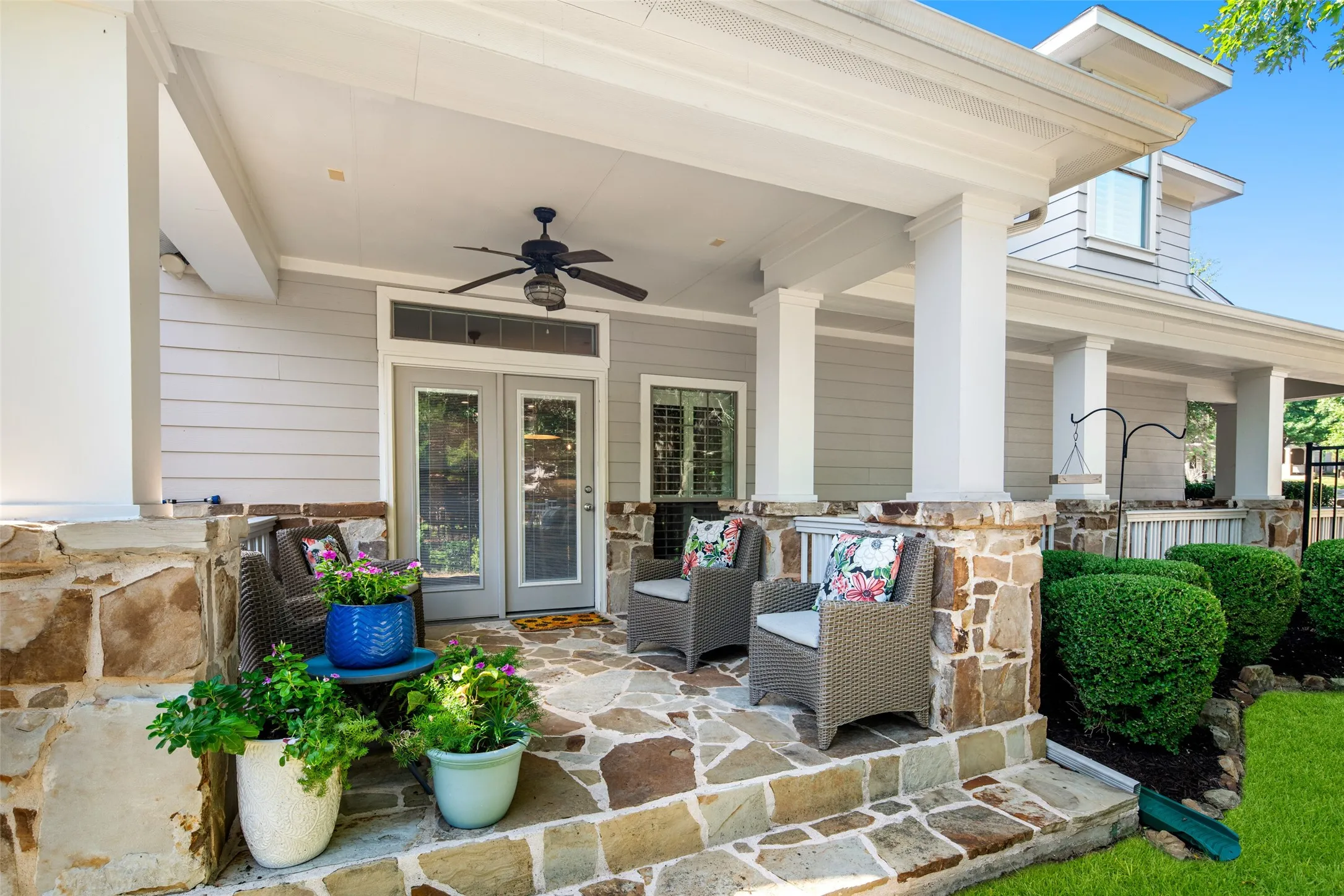 Peaceful Flagstone Covered Patio that features views to your private backyard!