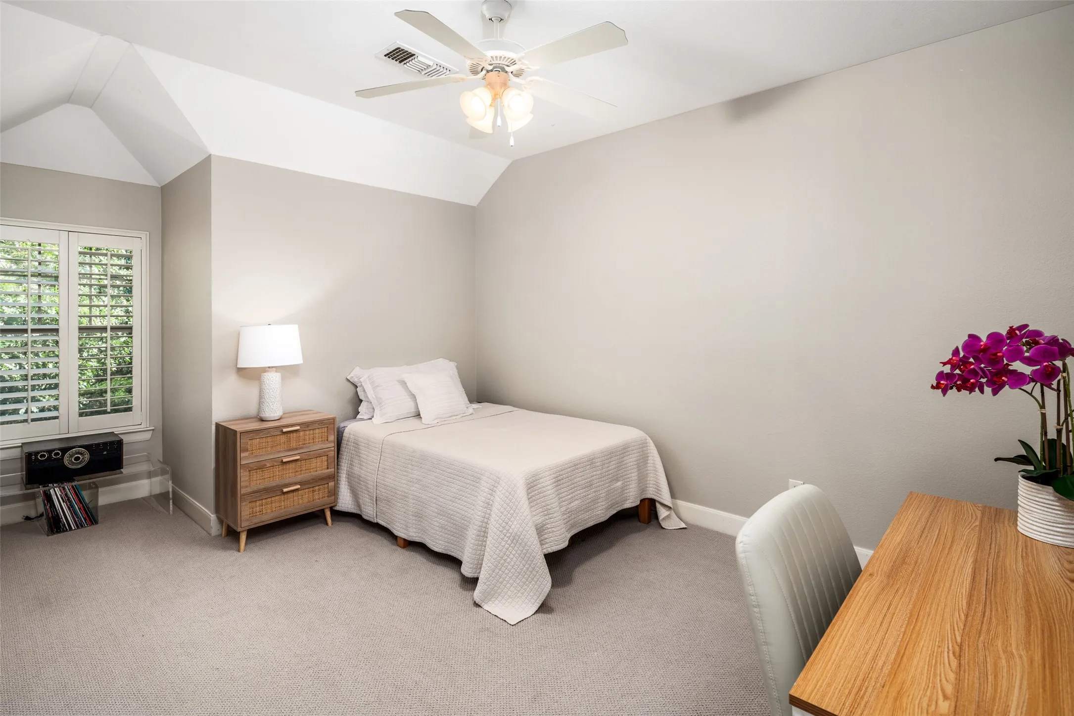Upstairs Secondary Bedroom with Walk In Closet.