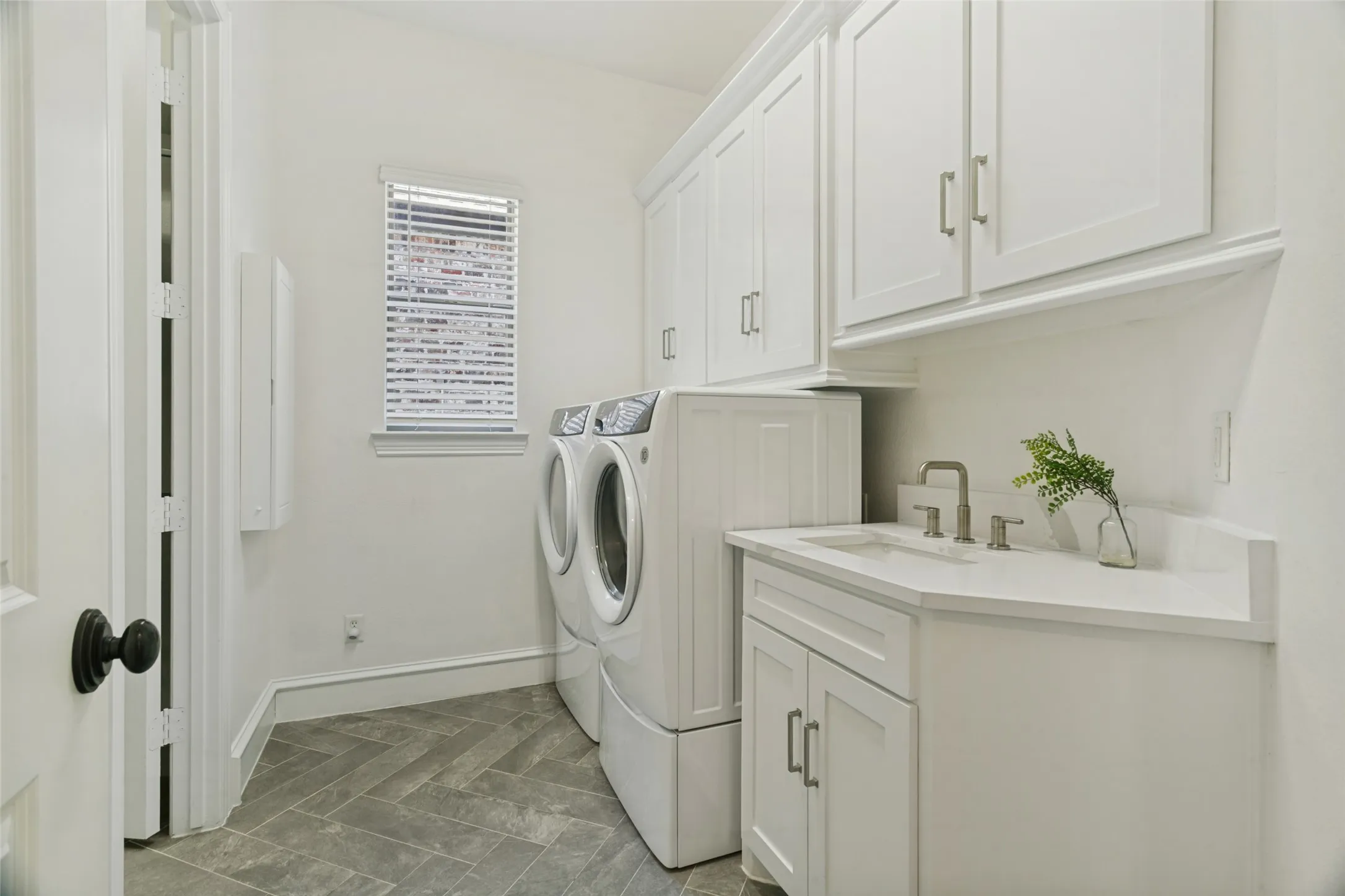 Recently remodeled, with a sink and built-in ironing board.