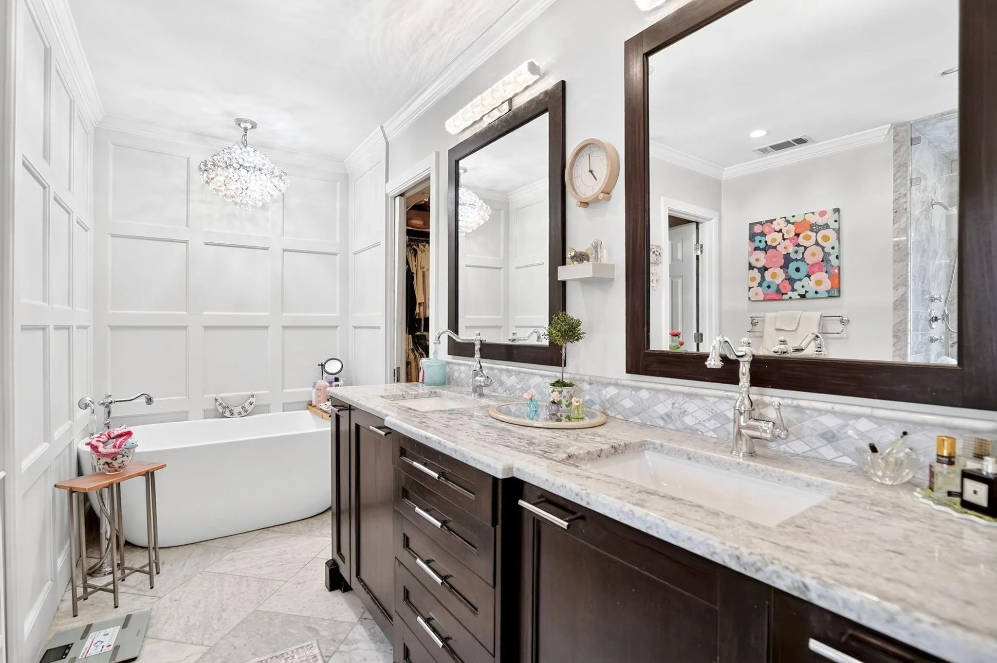 Double vanity with under-mount sinks and stone countertops