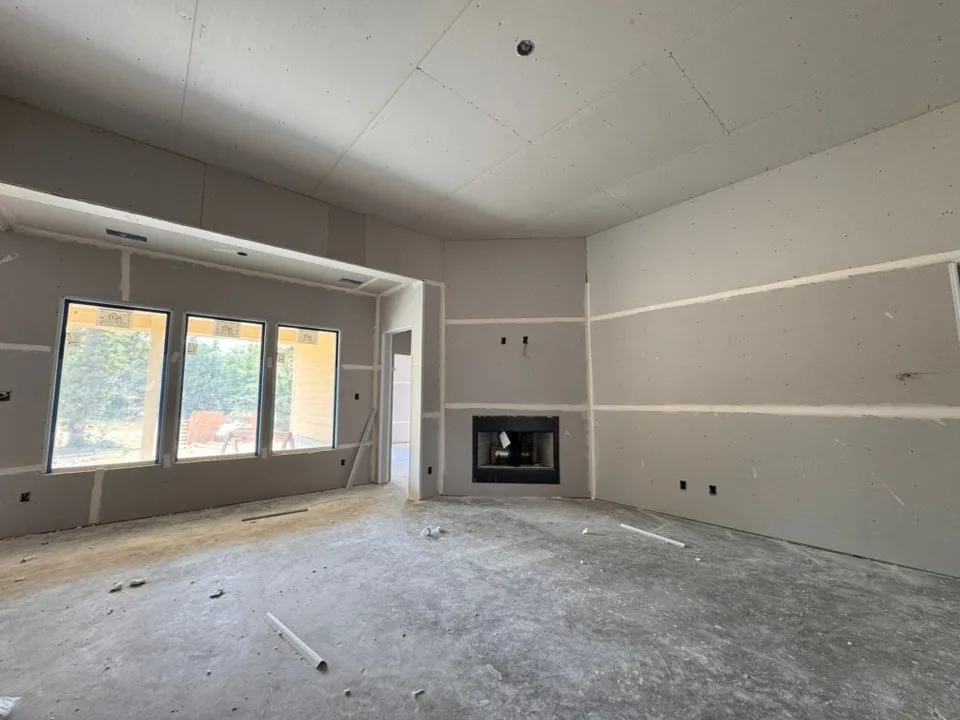 Recessed fireplace with a dark finish