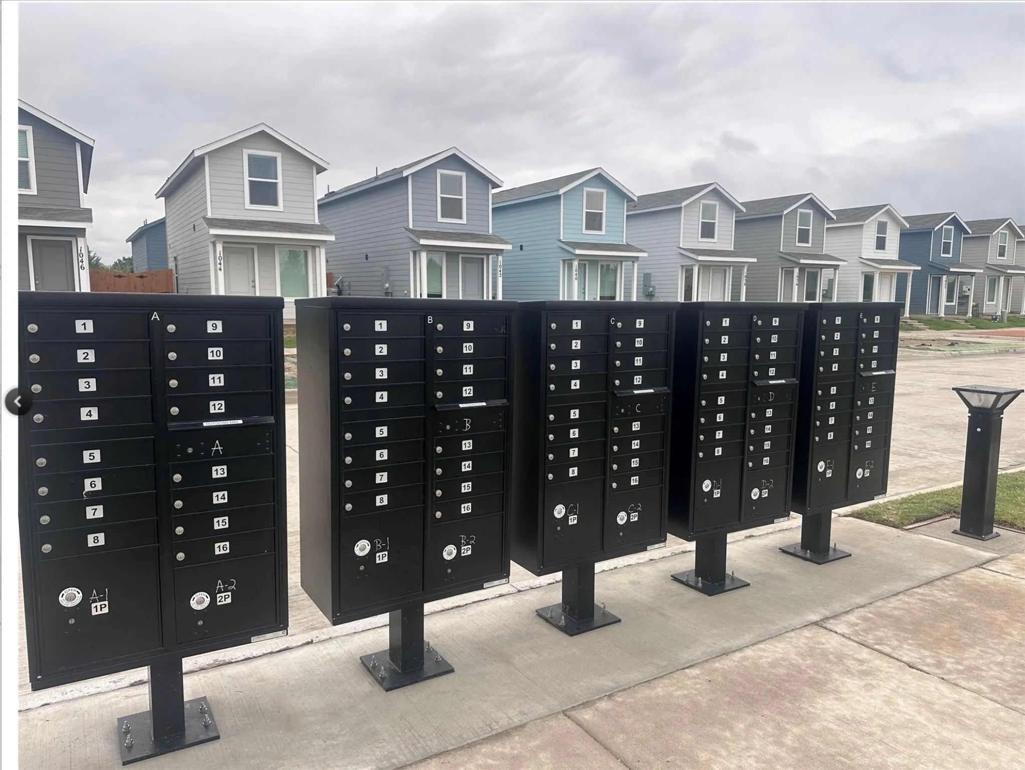 Community mailboxes with individual locking compartments