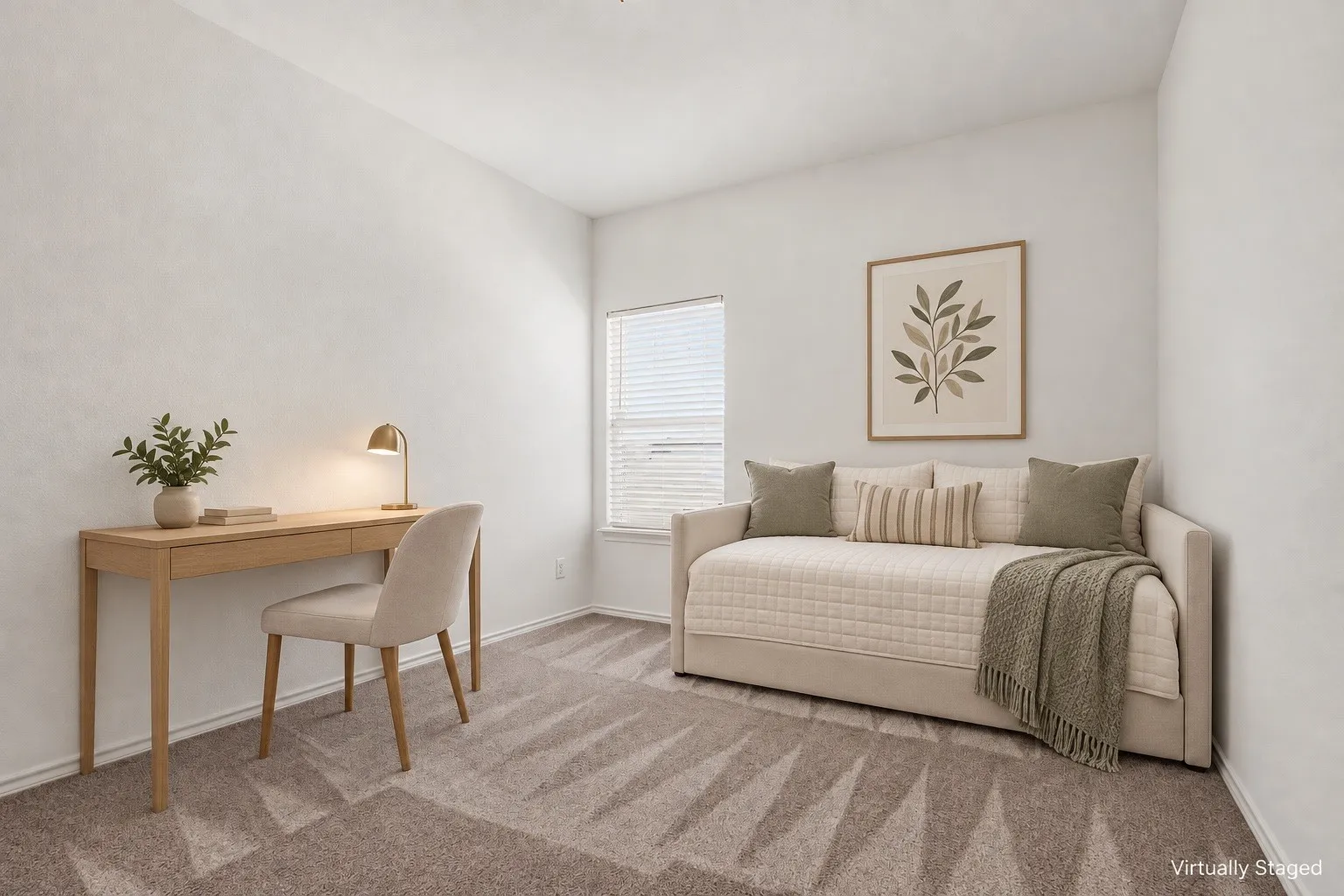 Virtually staged as a home office and guest room, illustrating a flexible setup with a desk and daybed.