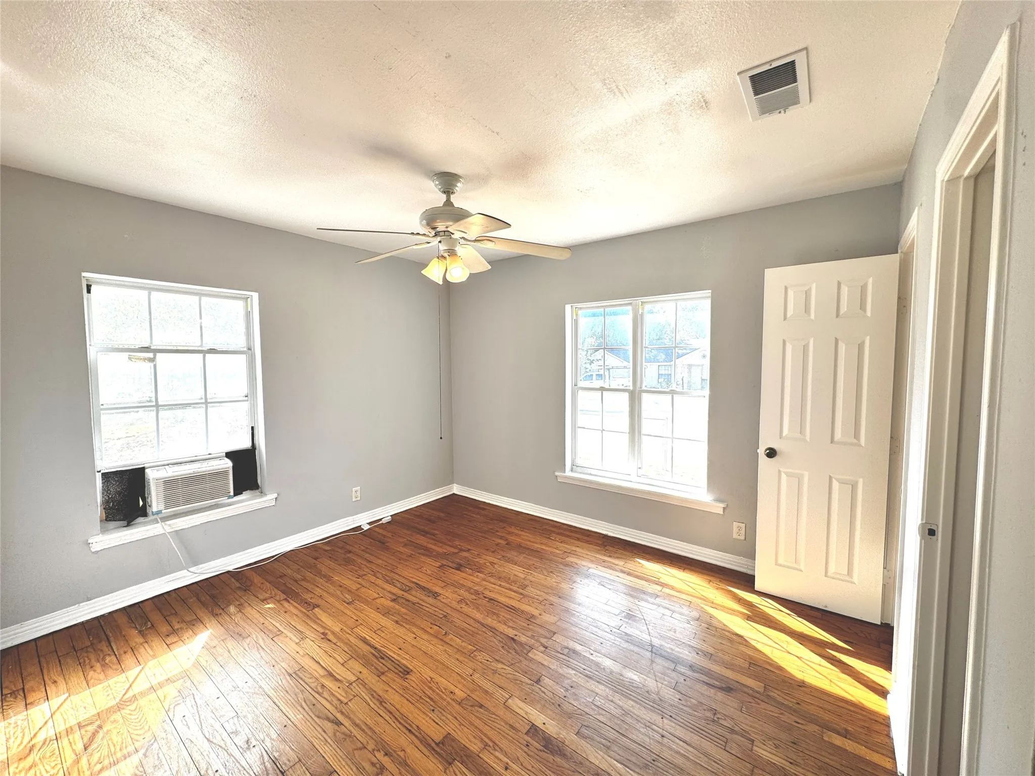 Wood-finish flooring with a neutral wall palette