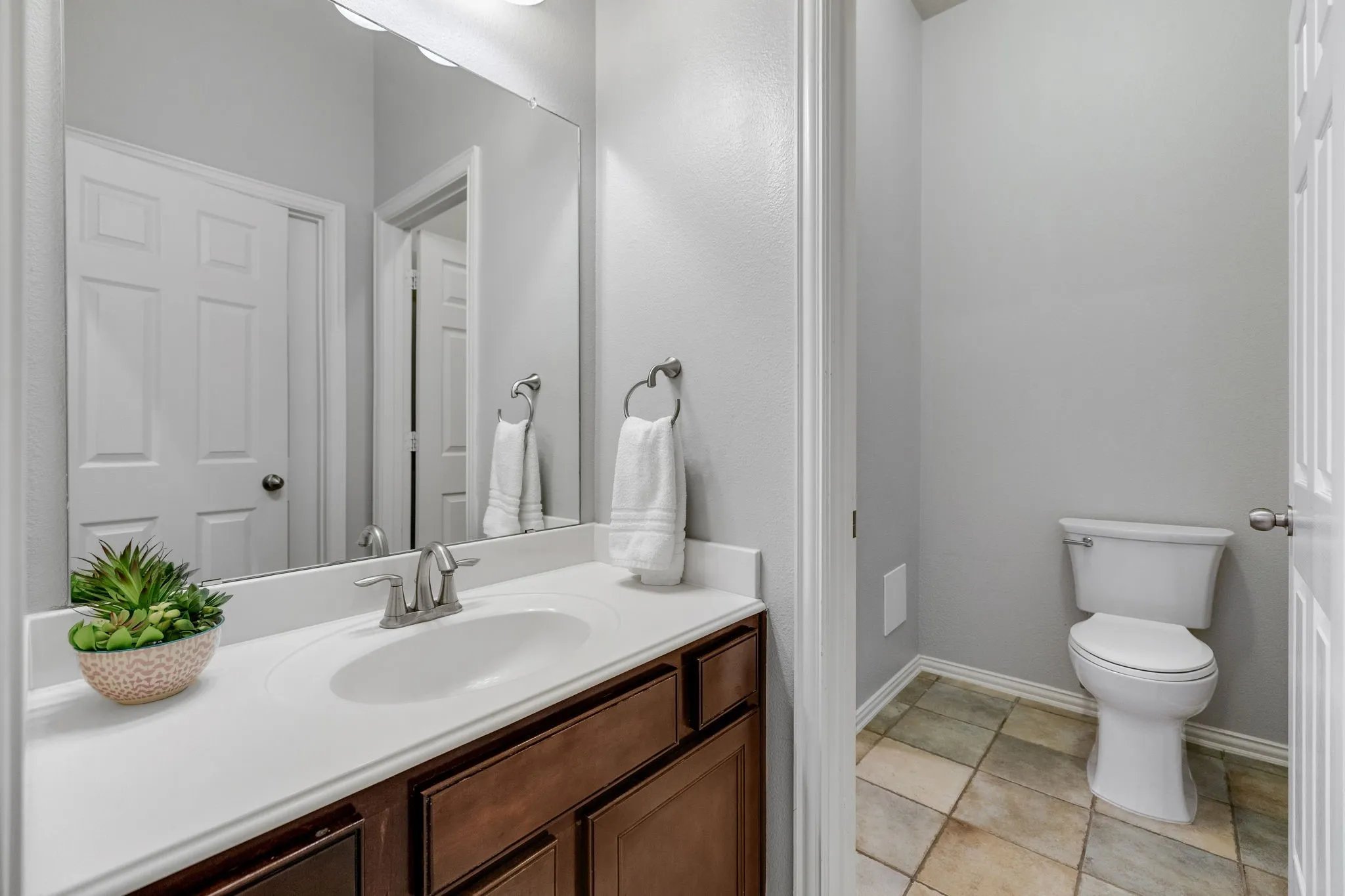 This is the first of three parts of the large jack and jill bathroom.  This side has access from the hallway.