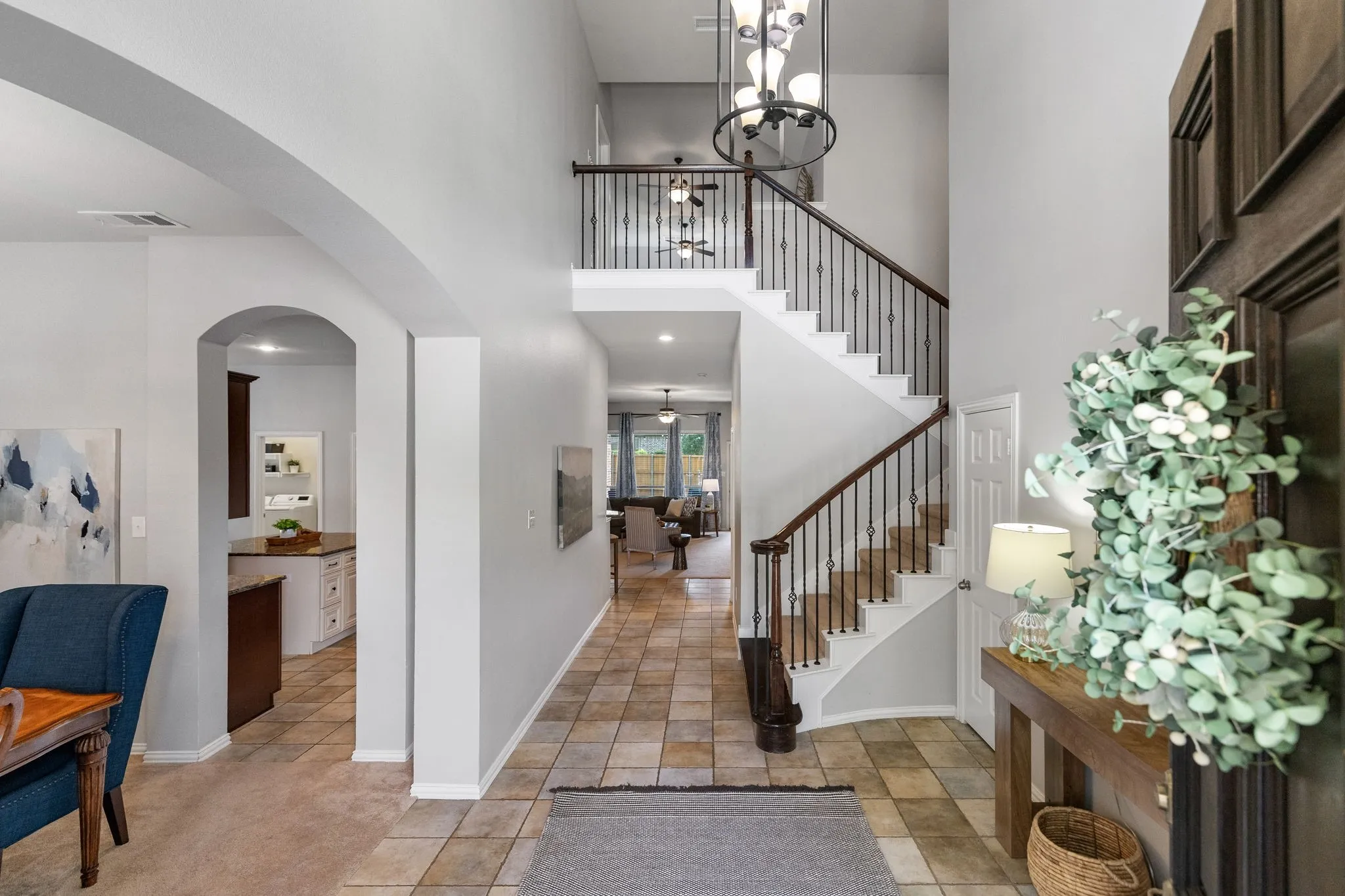 Step through the 8 foot solid mahogany front door into an impressive two-story foyer with recent neutral paint & new chandelier.