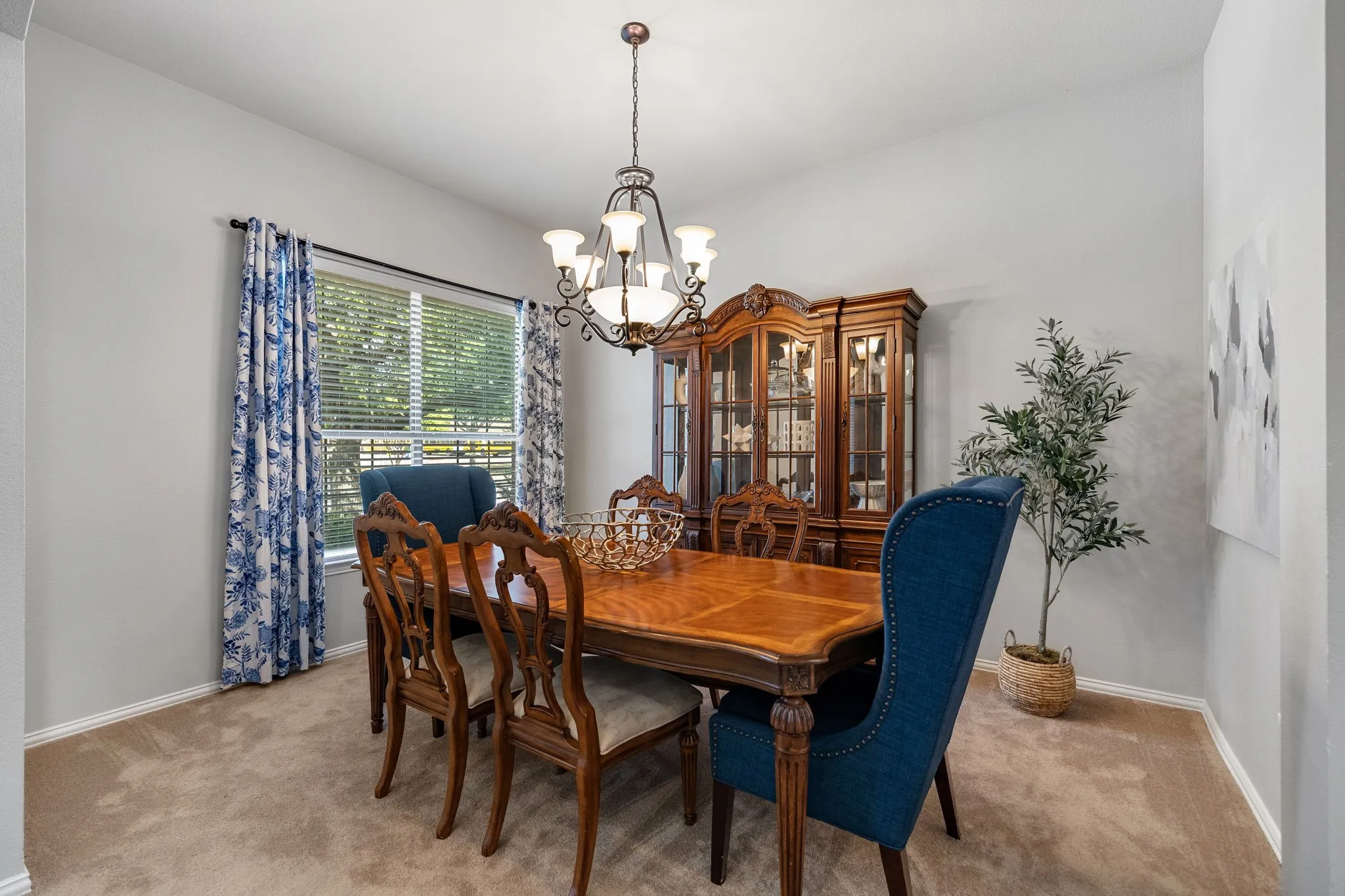 Spacious dining room with large window and lots of light.