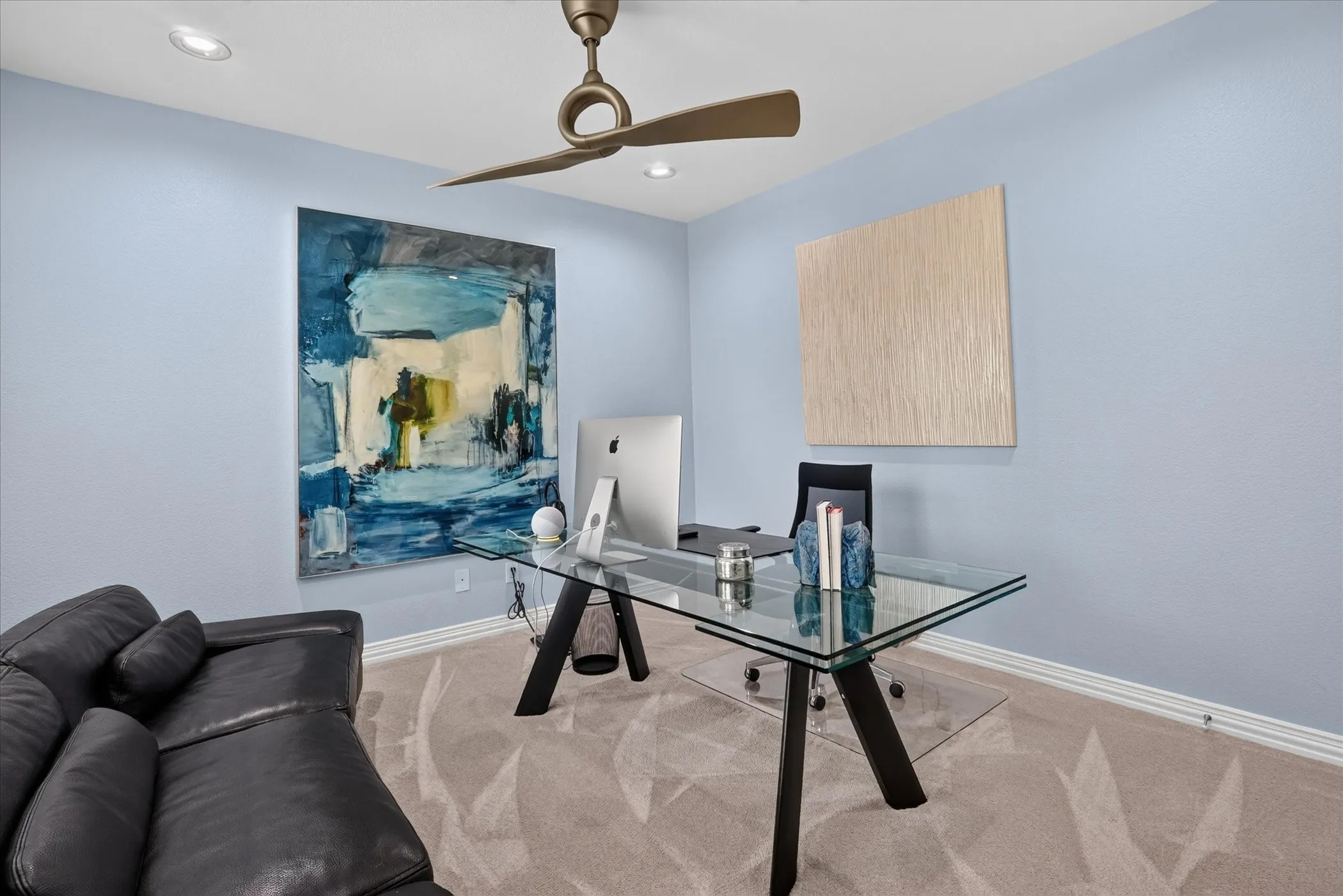 Recessed lighting, ceiling fan, carpeting, and light blue wall finish