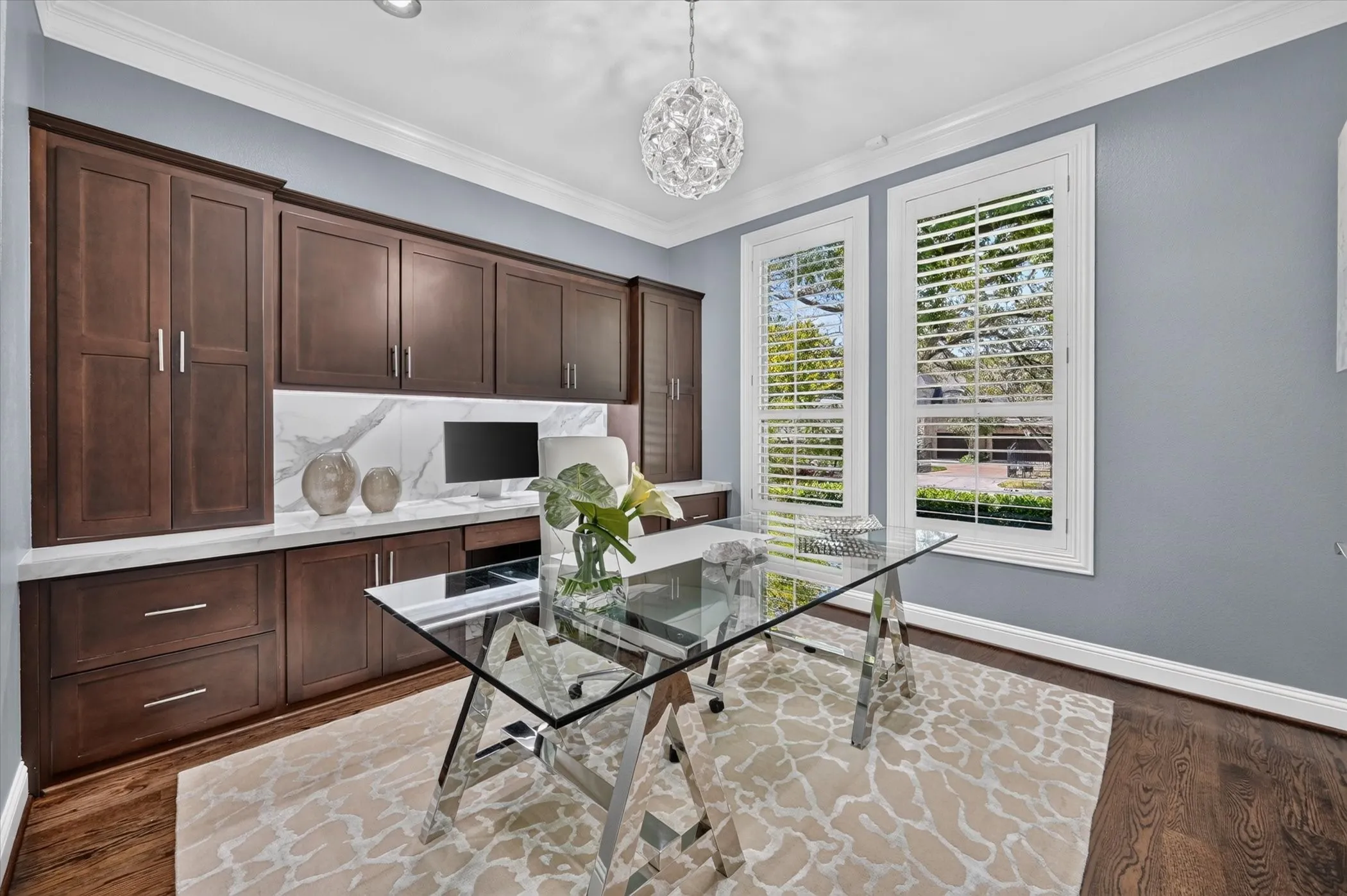 Built-in cabinetry with white countertops and a matching backsplash