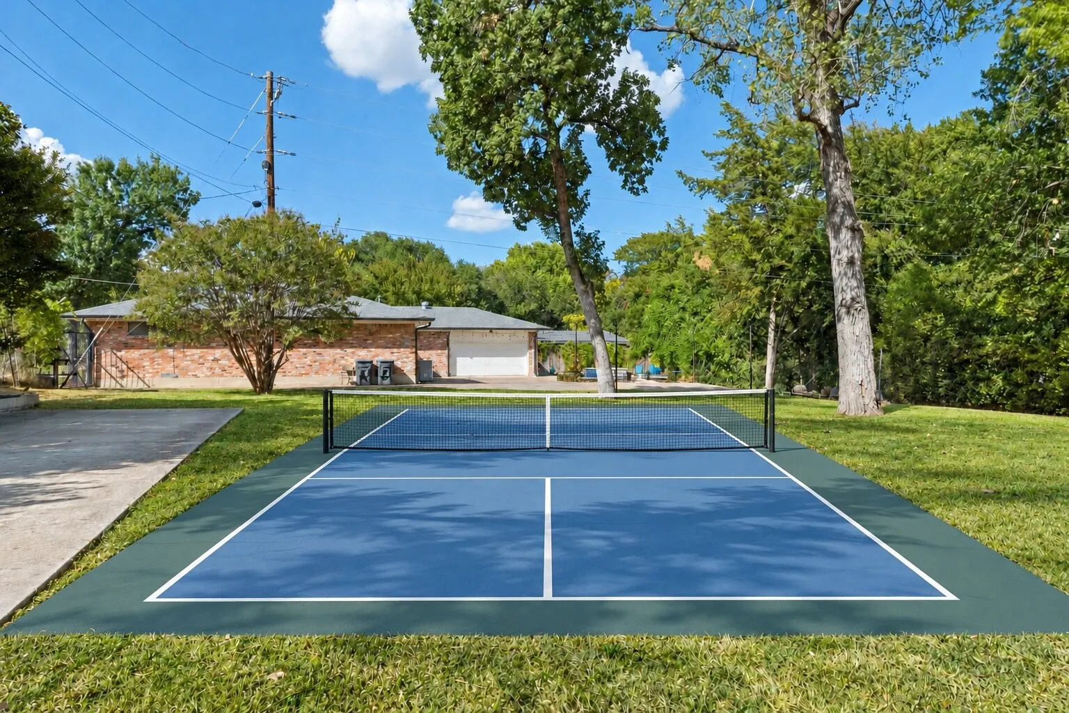 Rendering of pickleball court. Grass has been enhanced to show potential.