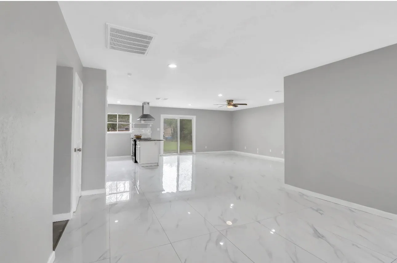 Entrance view from front door.  Large open concept with 2 living spaces and a dining area.