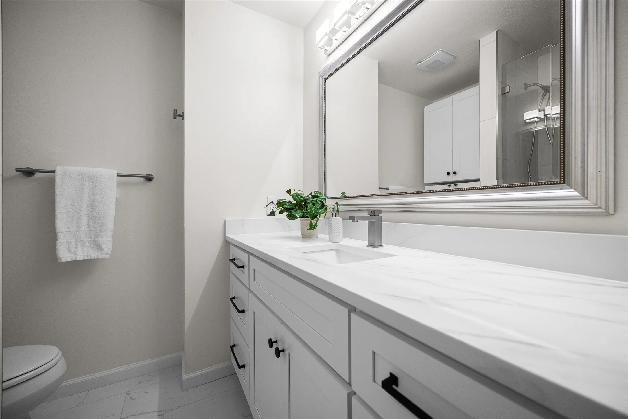 Secondary bathroom with walk-in shower