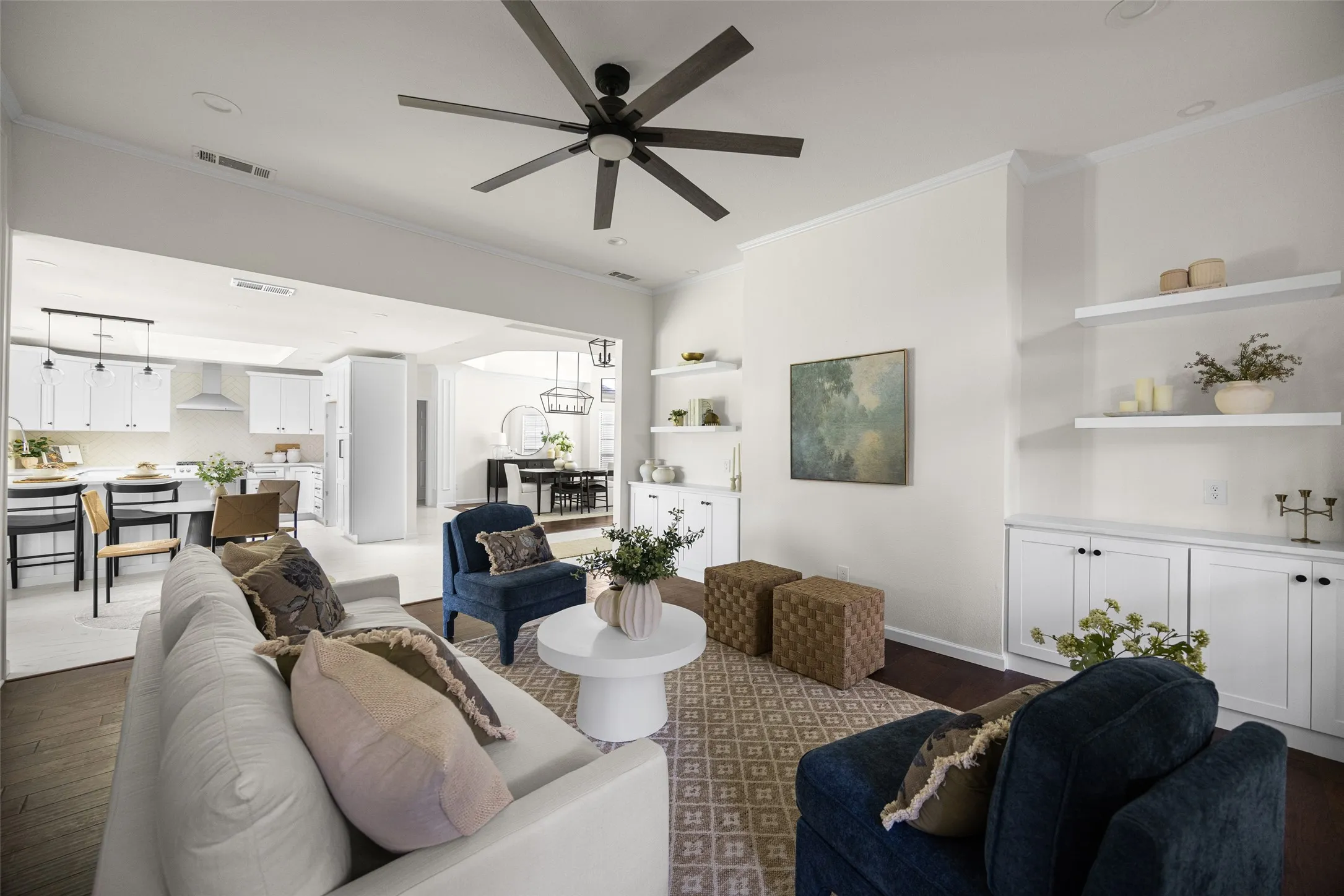 Family room seating area with hardwood flooring