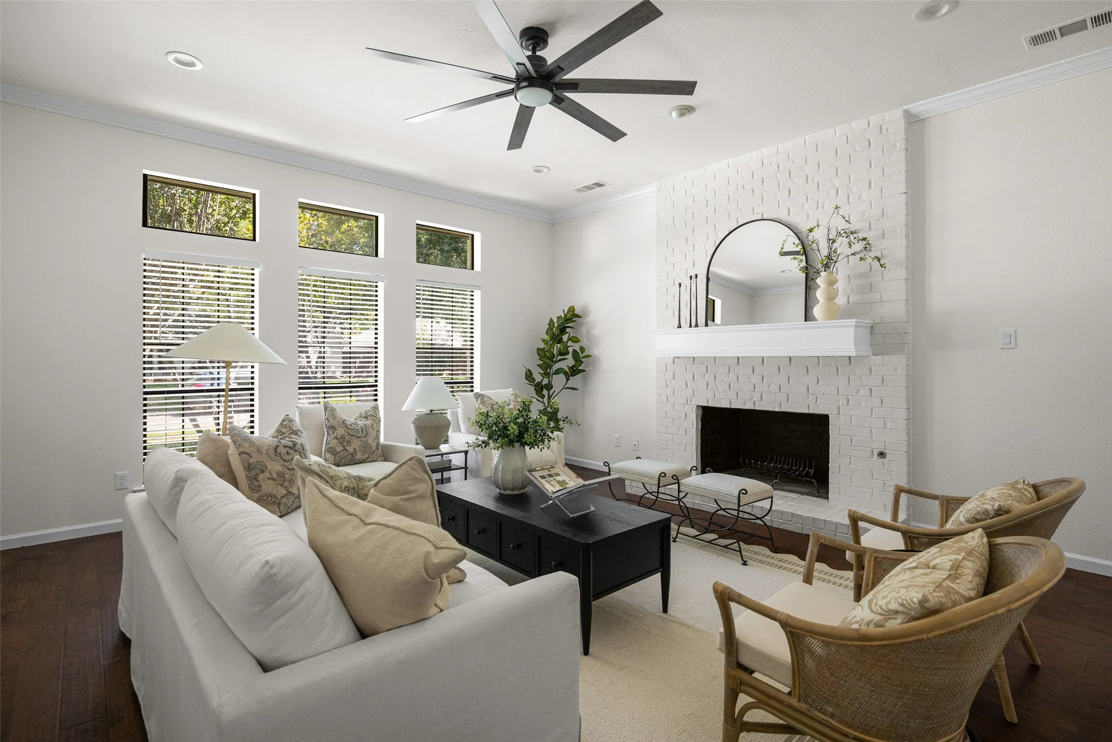 Living room with fireplace and large windows