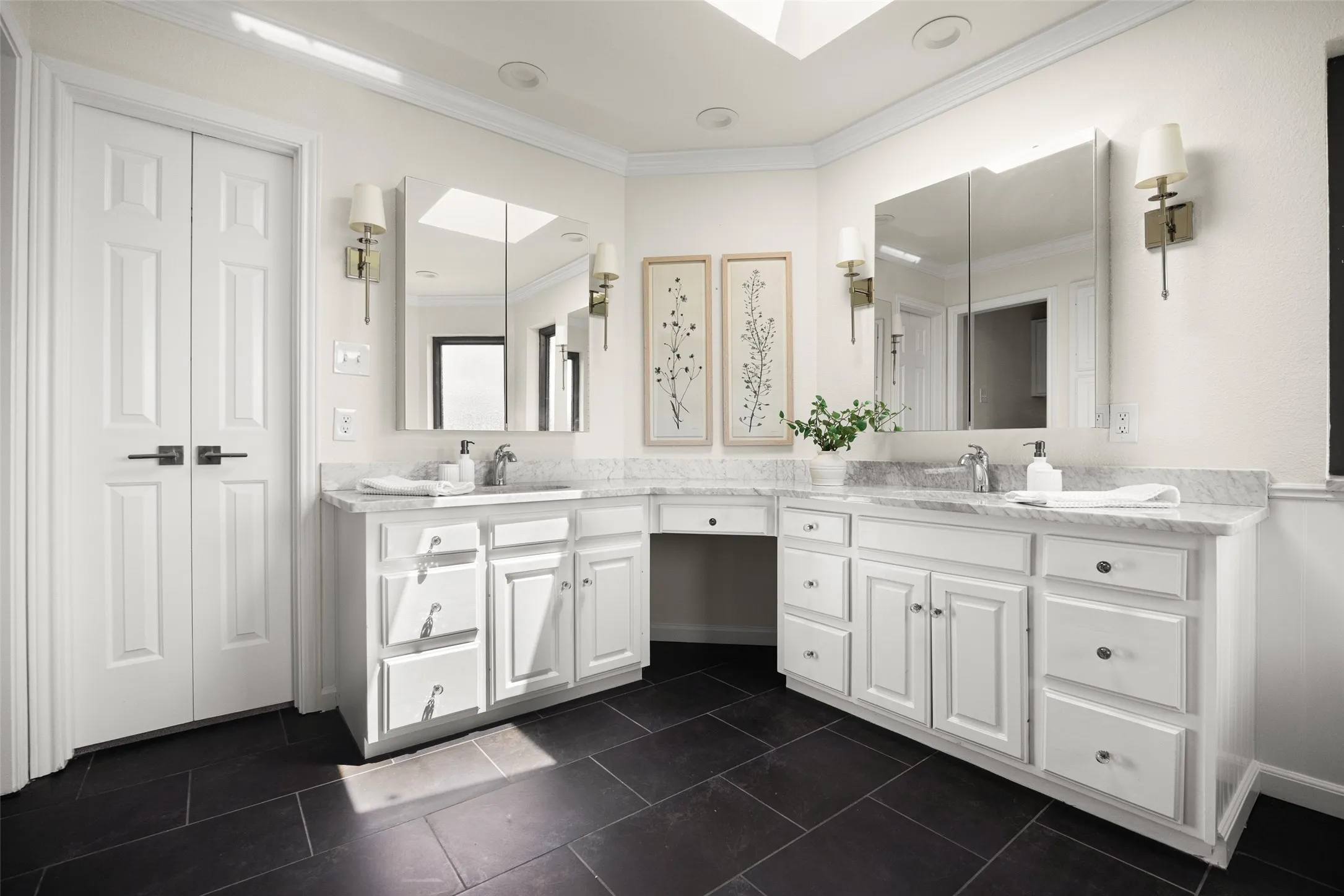 Primary bathroom with dual vanity and soaking tub