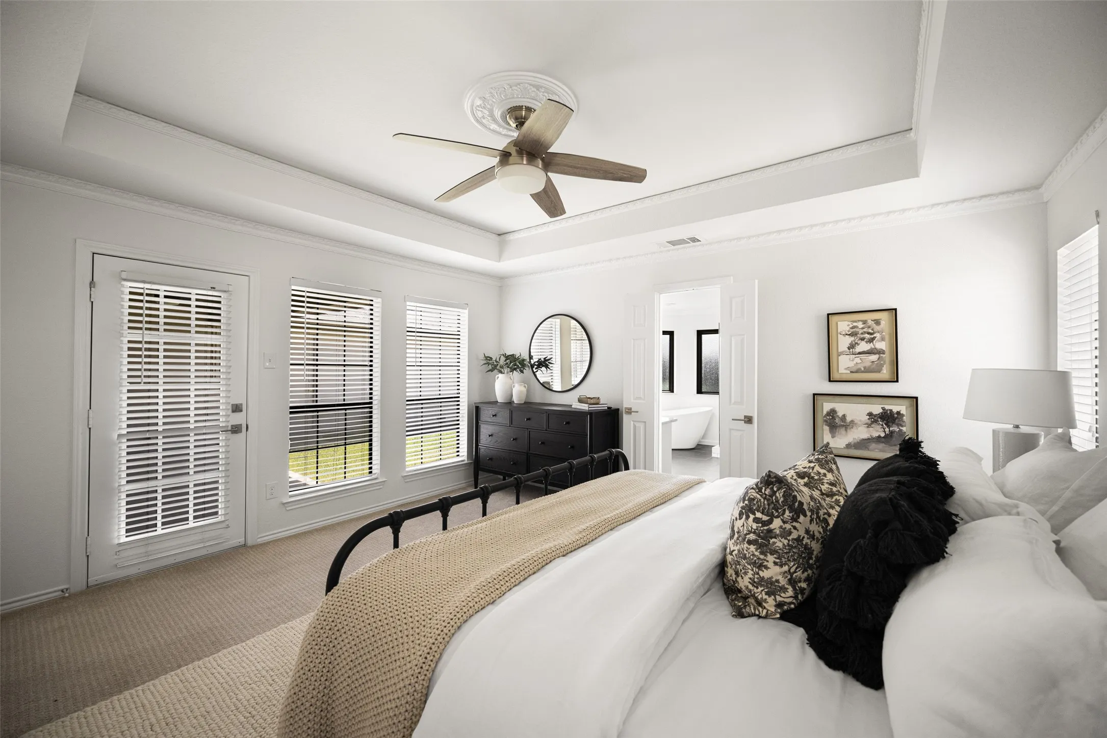 Bedroom with large window and closet