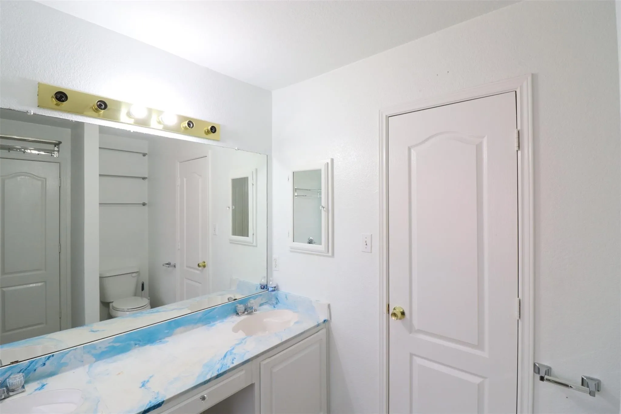 Vanity with dual sinks and a patterned countertop
