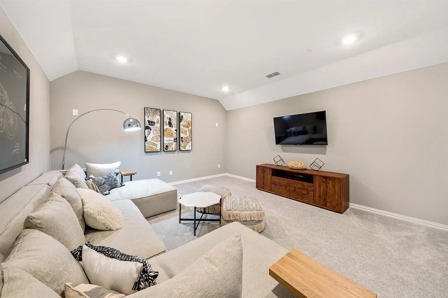 Vaulted ceilings and neutral wall tones