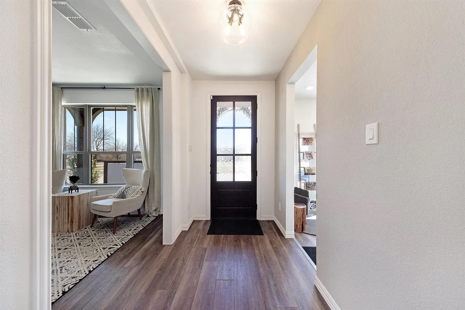 Wood-finish flooring throughout the entryway