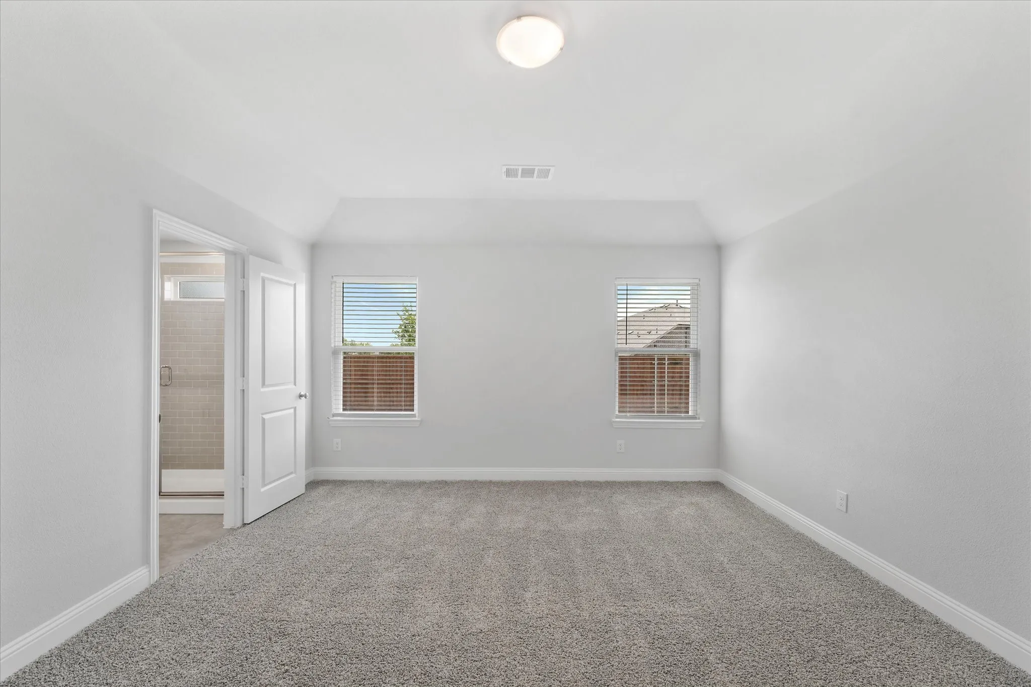 View of carpeted spare room