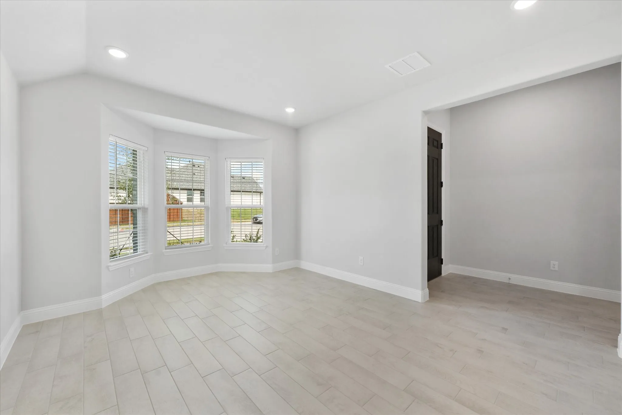 Unfurnished room featuring light hardwood / wood-style flooring