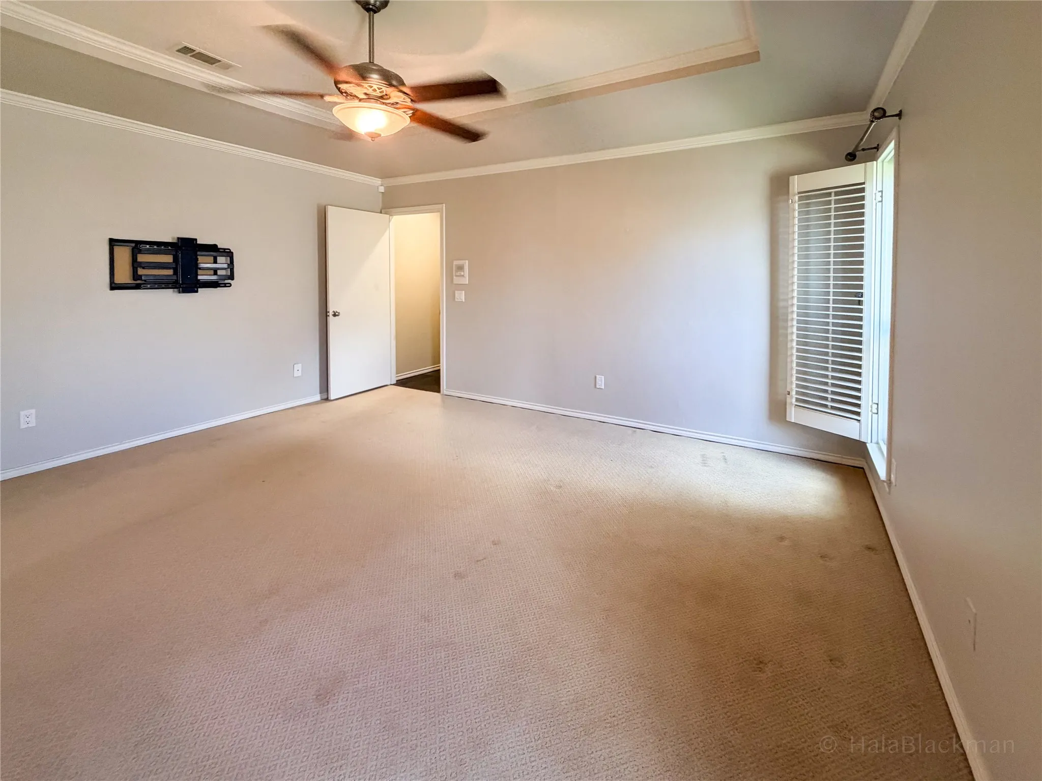 primary bedroom, has a door to patio
