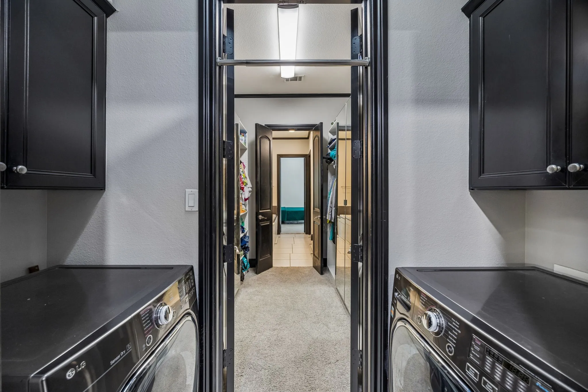 Laundry connected to Primary bedroom through primary closet.