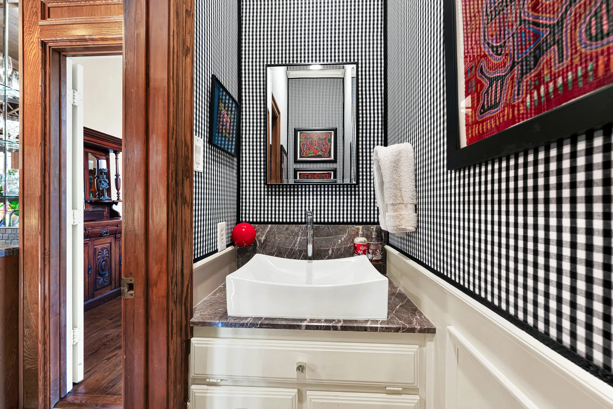 1/2 bathroom on first floor near kitchen, great room, and dining room
