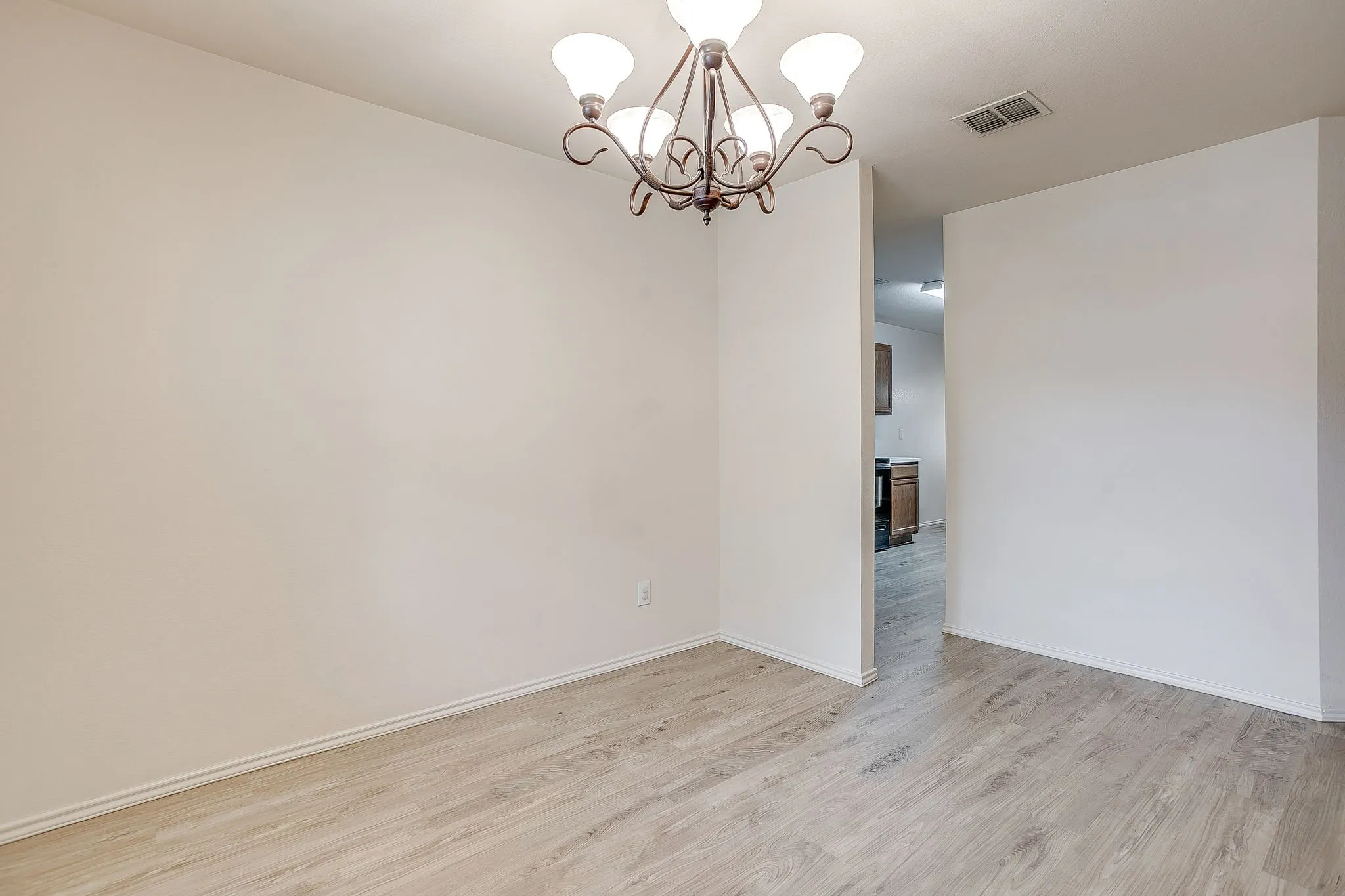 Dining Room off of entry and view into kitchen