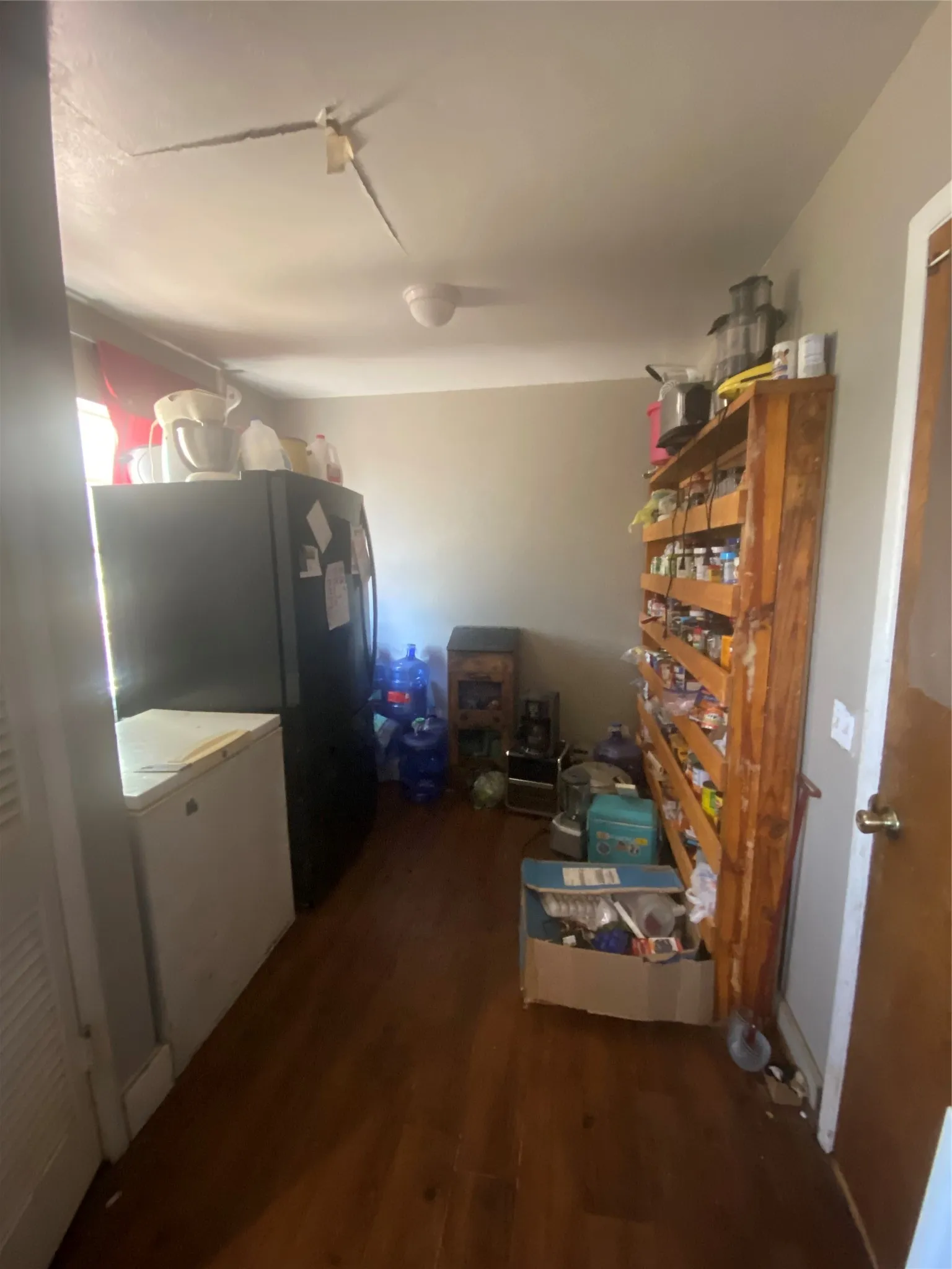 Extra Room off kitchen. Door goes to garage.
