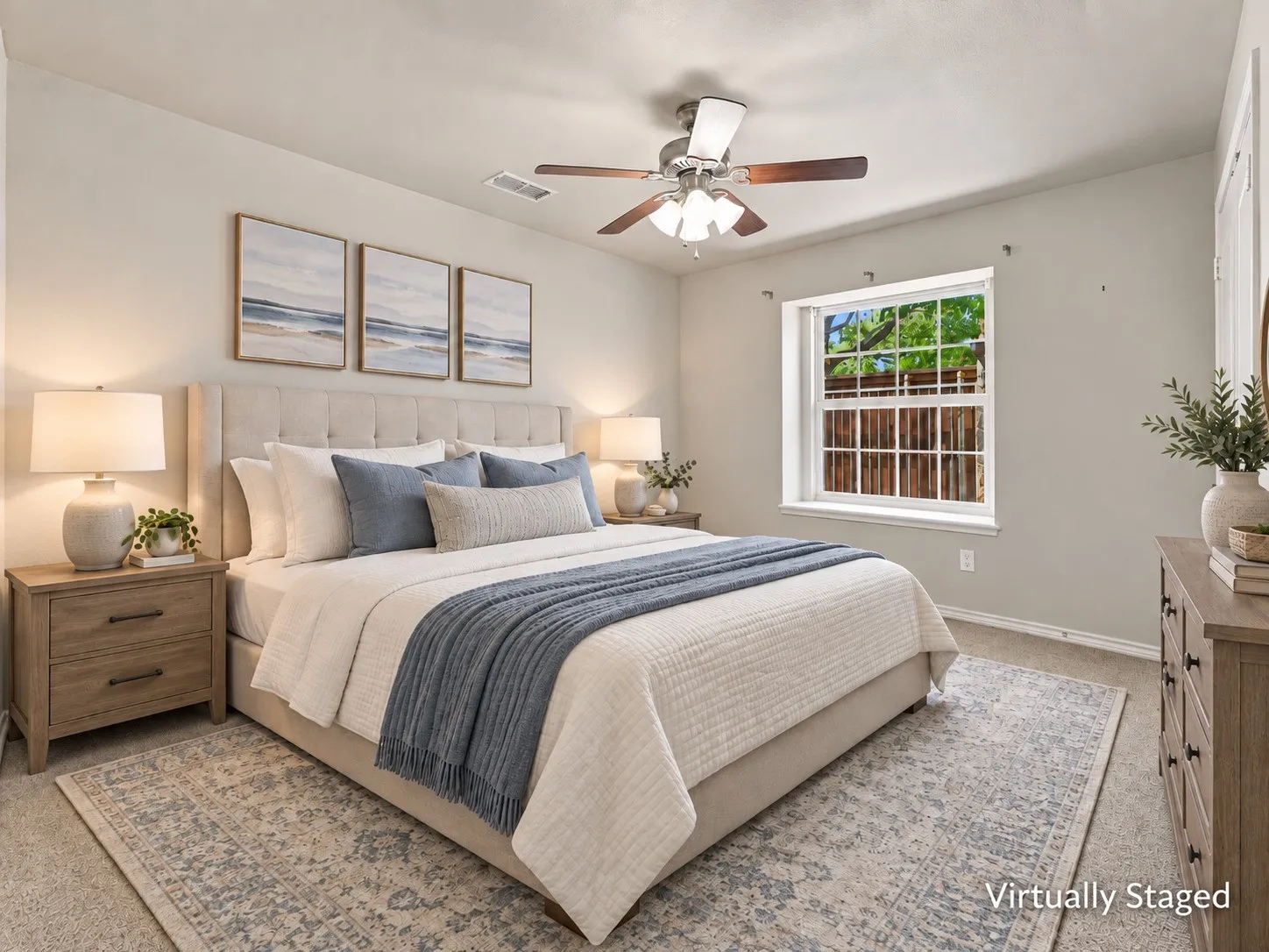 Neutral wall tones, ceiling fan with light fixture, carpet flooring, and a single window with outdoor views