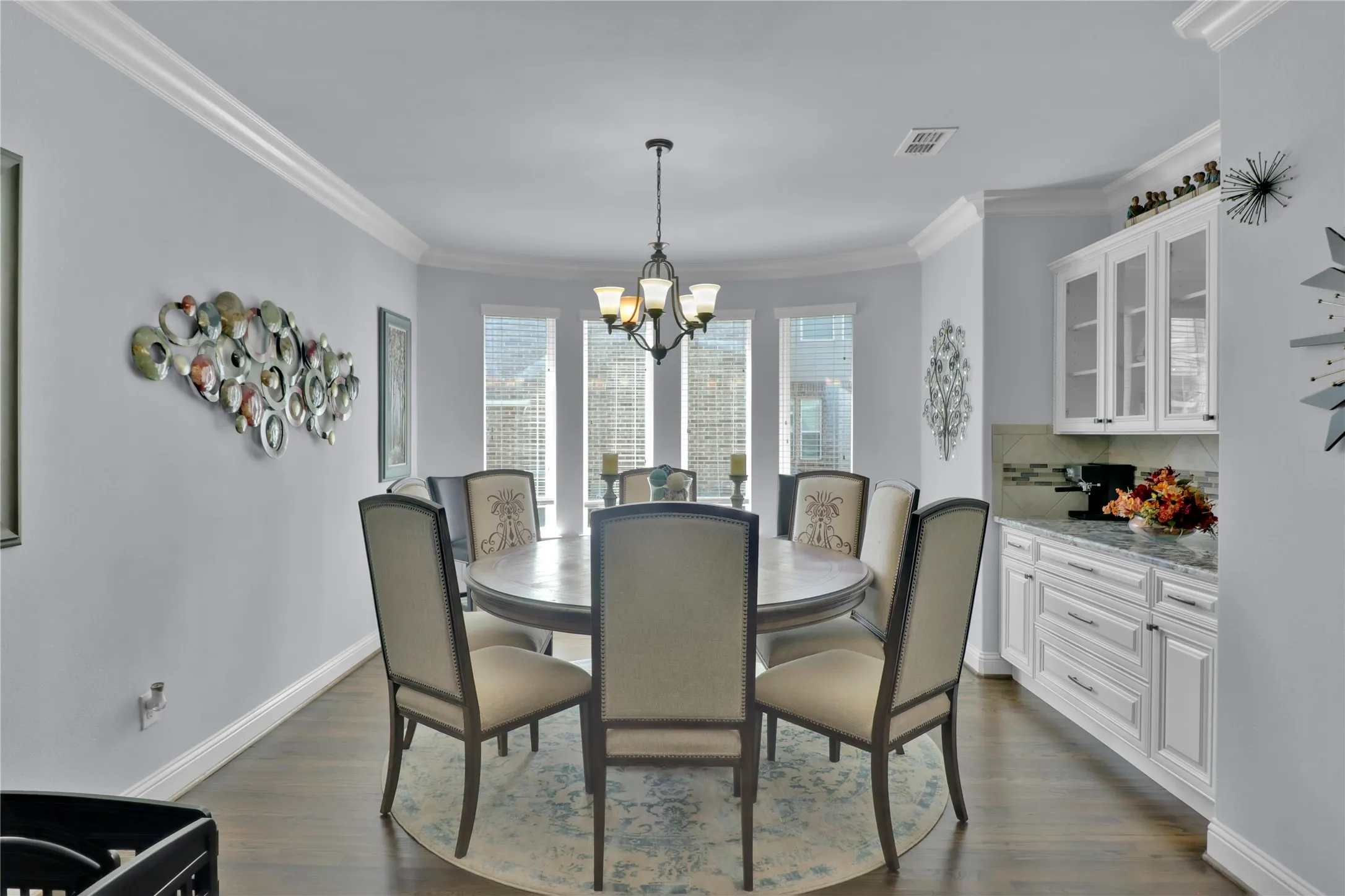 Formal dining with built in cabinets.