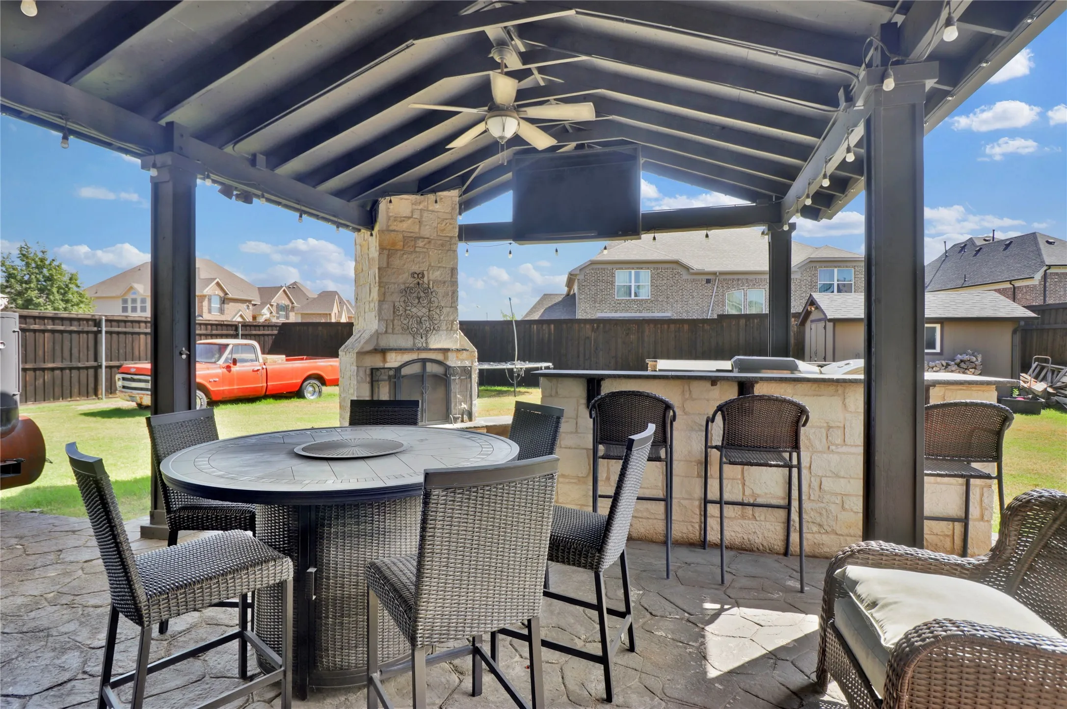 Extended covered patio is the perfect outdoor entertaining space.