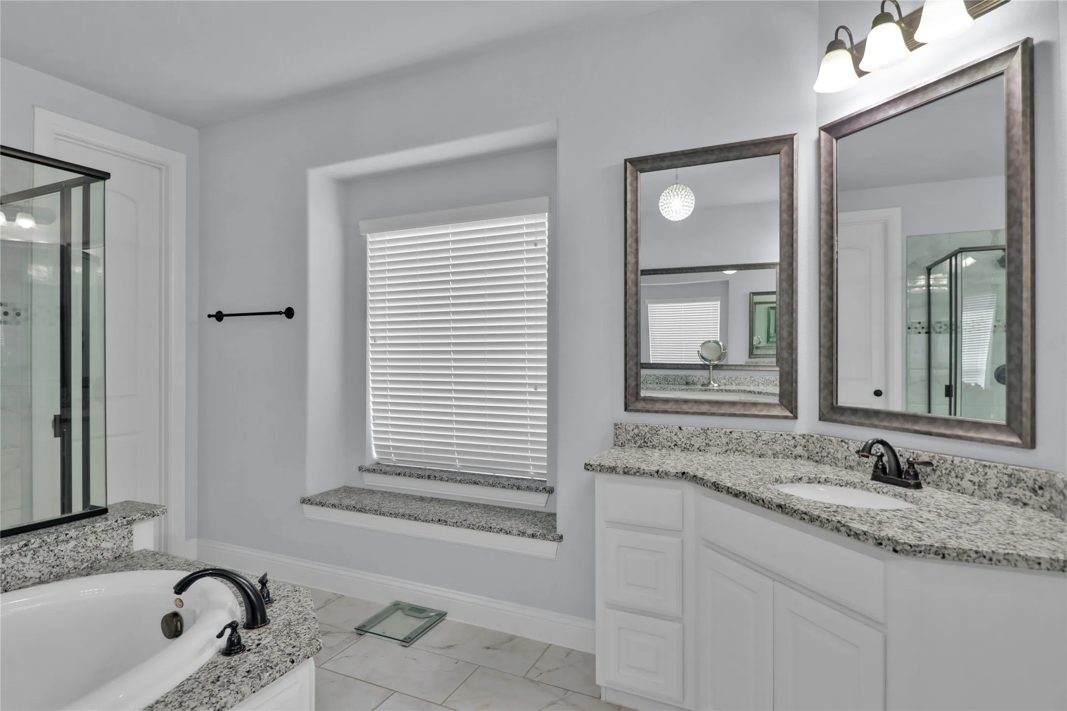 Second vanity and window seat.